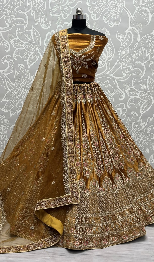Embroidery Velvet Lehenga Choli In Golden