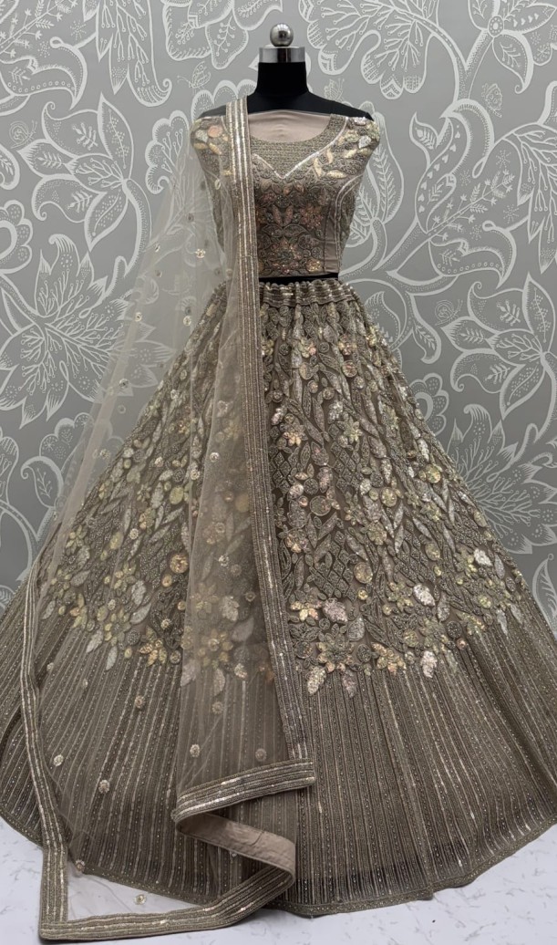 Eye-Catchy Golden Lehengacholi studded with zircon diamond and Full of Sequins work 