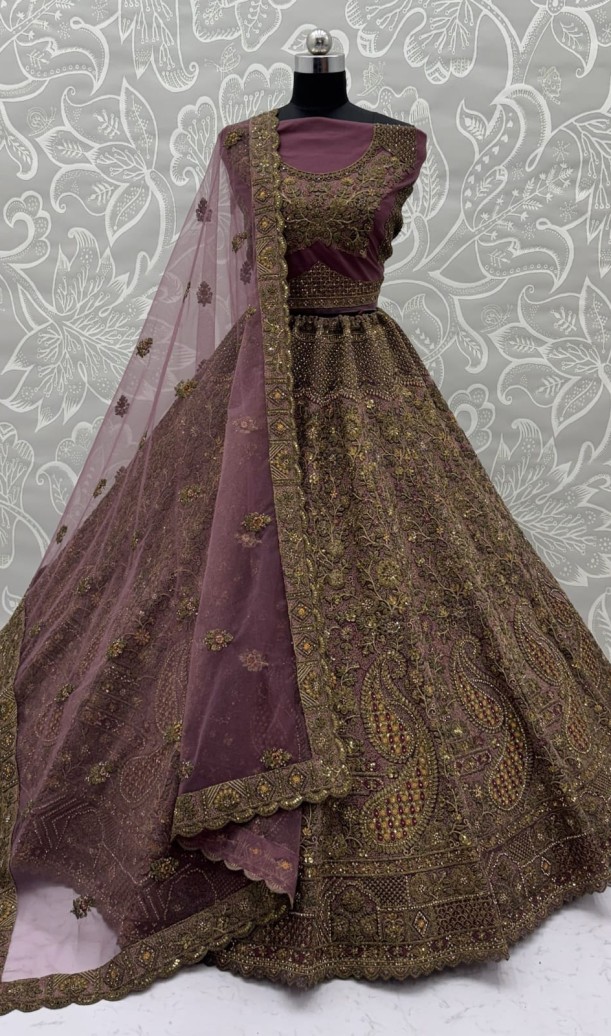 Luxurious Mauve Dori Work Net Reception Wear Lehenga With Blouse