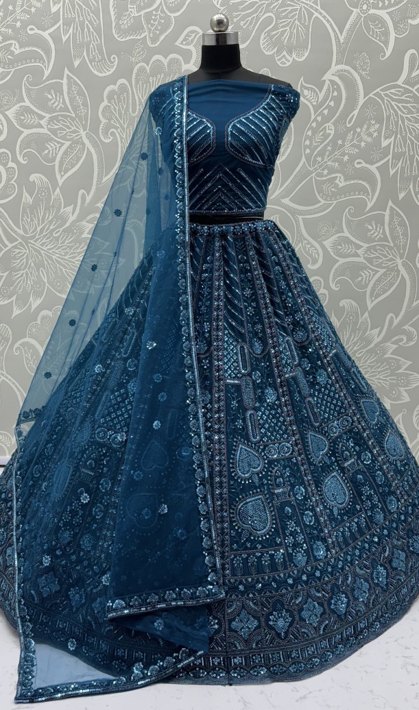 Sober Handwork Blue Motif and Crystal Pipe work Designed Reception Wear Collection in Lehenga Choli