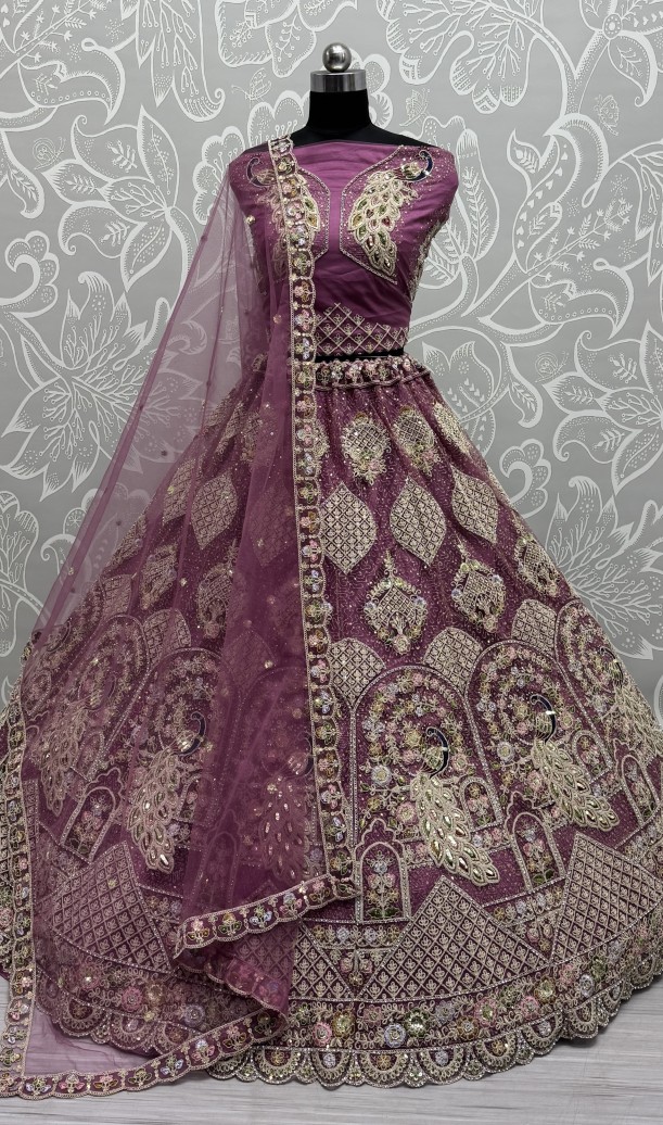 Outstanding dark pink  Dori Embroidery with Heavy Diamond Embedded Peacock pattern with Sequins work Designer Partywear Lehenga choli