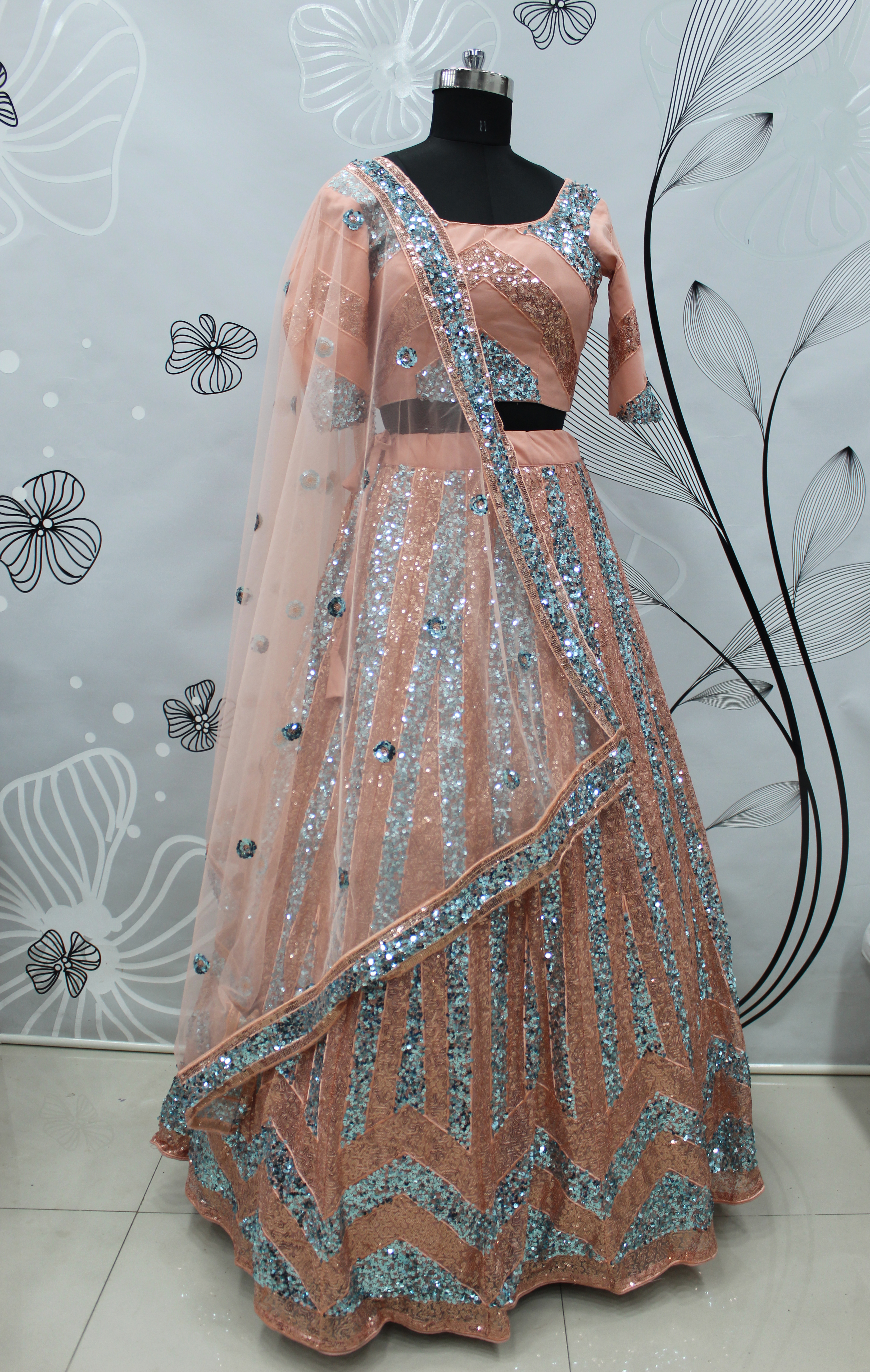 Embroidered work Net Lehenga Choli in Peach