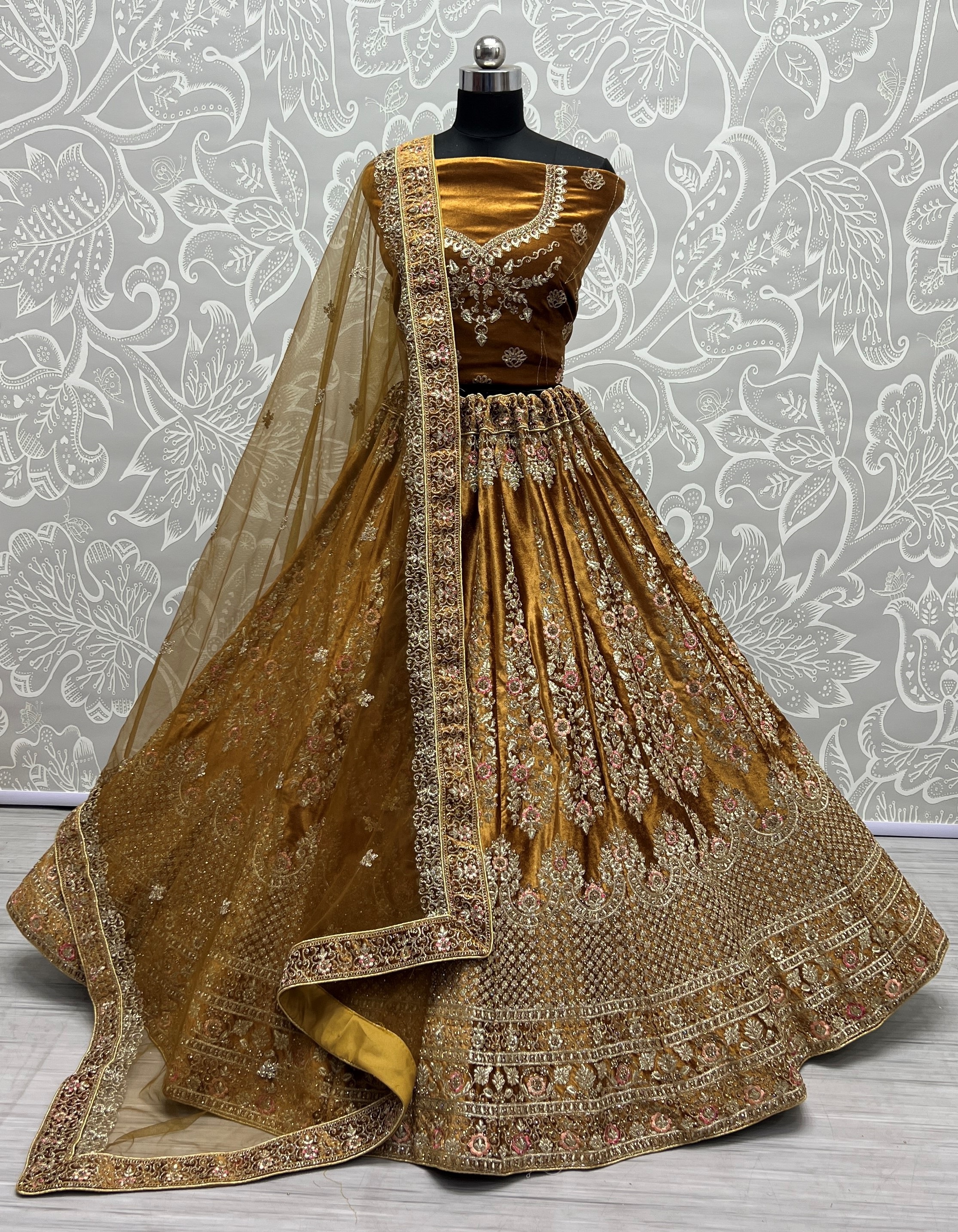 Embroidery Velvet Lehenga Choli In Golden