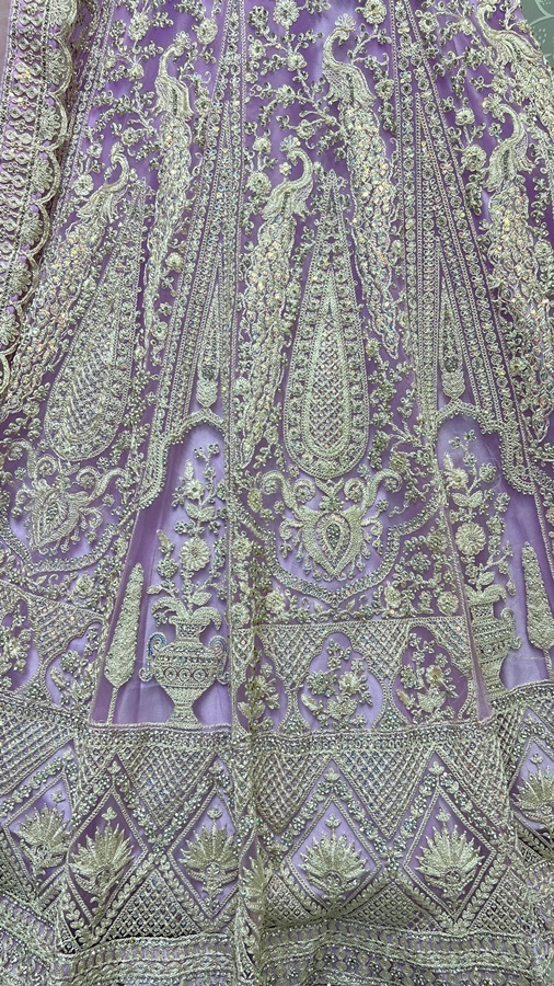 Five meter plus flair peacock pattern embroidered partywear Lehengacholi 