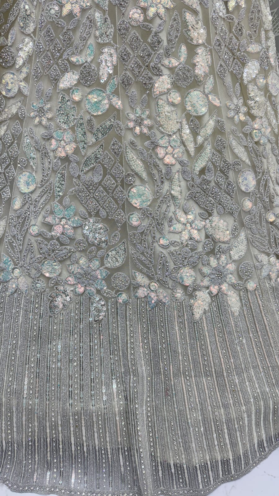 Eye-Catchy Silver Grey Lehengacholi studded with zircon diamond and Full of Sequins work 