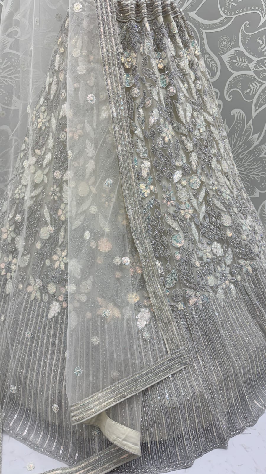 Eye-Catchy Silver Grey Lehengacholi studded with zircon diamond and Full of Sequins work 