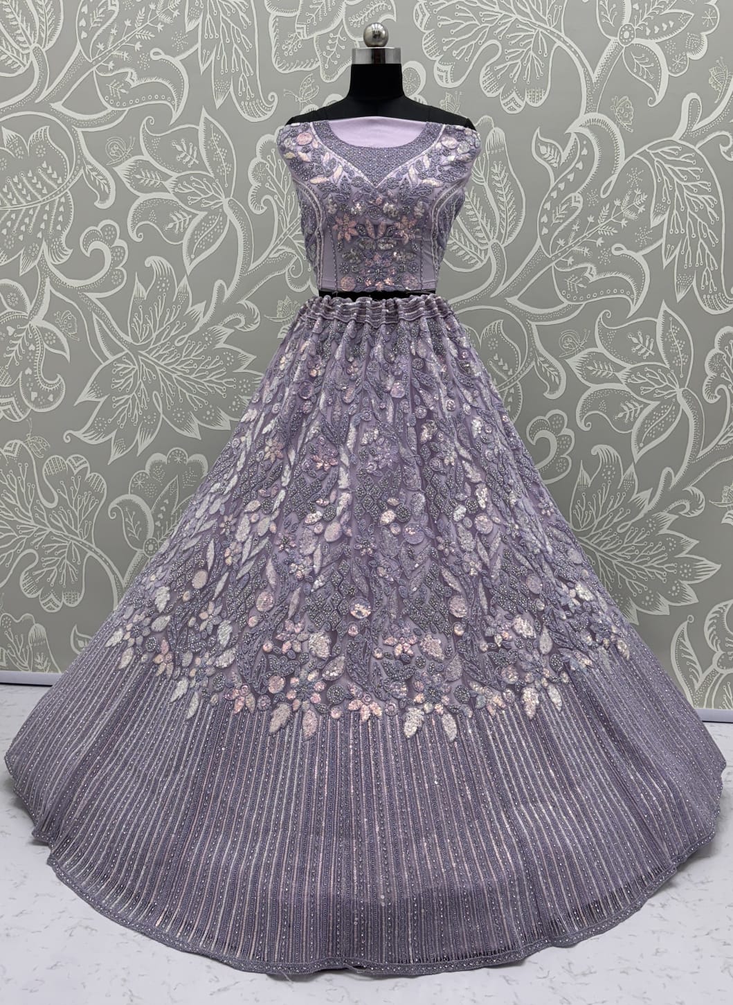 Eye-Catchy Lavender Lehengacholi studded with zircon diamond and Full of Sequins work 