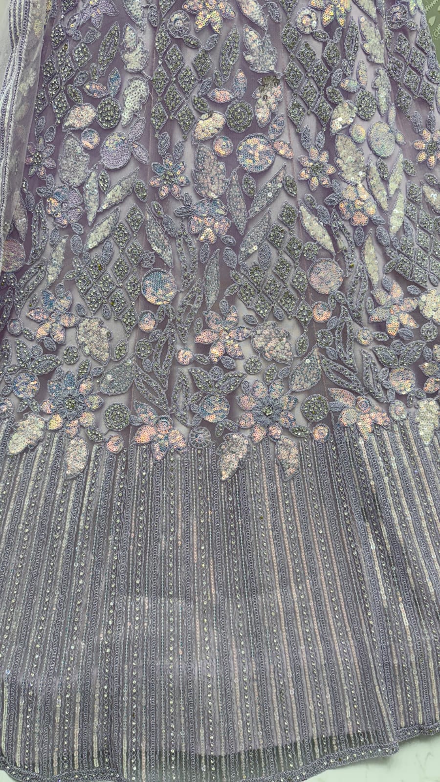 Eye-Catchy Lavender Lehengacholi studded with zircon diamond and Full of Sequins work 