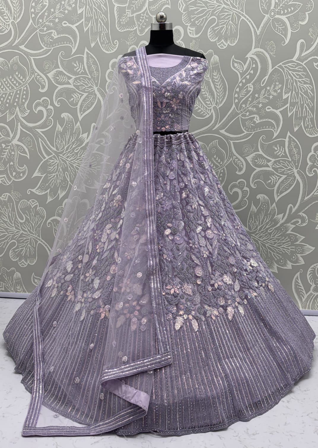 Eye-Catchy Lavender Lehengacholi studded with zircon diamond and Full of Sequins work 