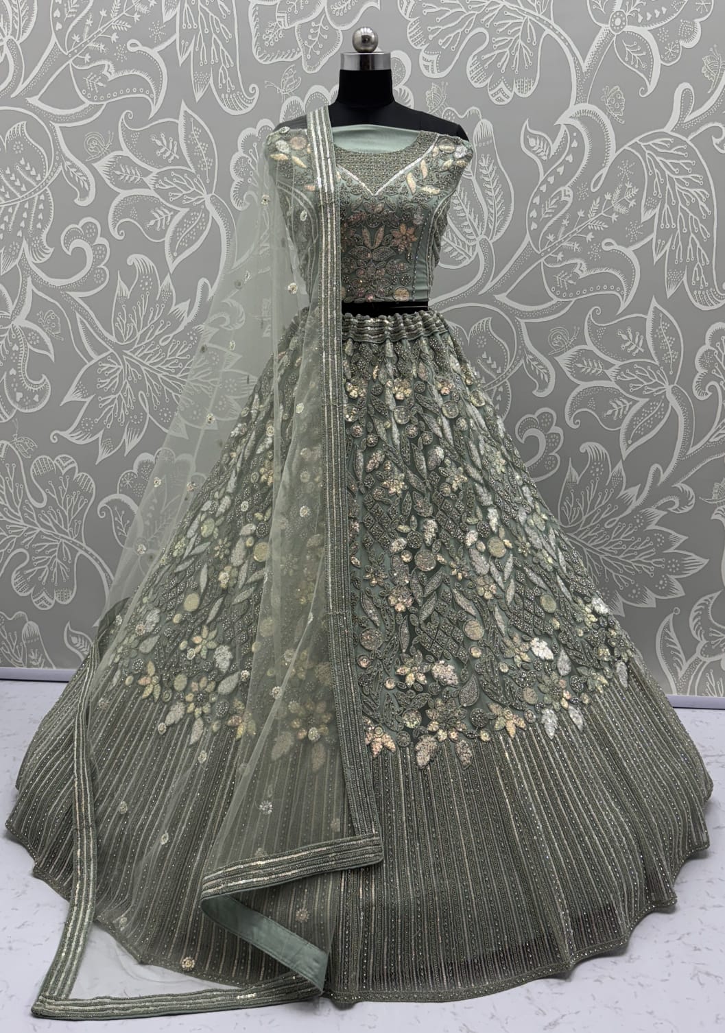 Eye-Catchy Olive Green Lehengacholi studded with zircon diamond and Full of Sequins work 