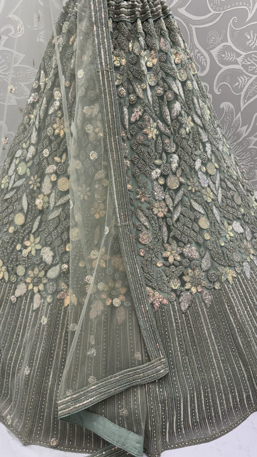 Eye-Catchy Olive Green Lehengacholi studded with zircon diamond and Full of Sequins work 