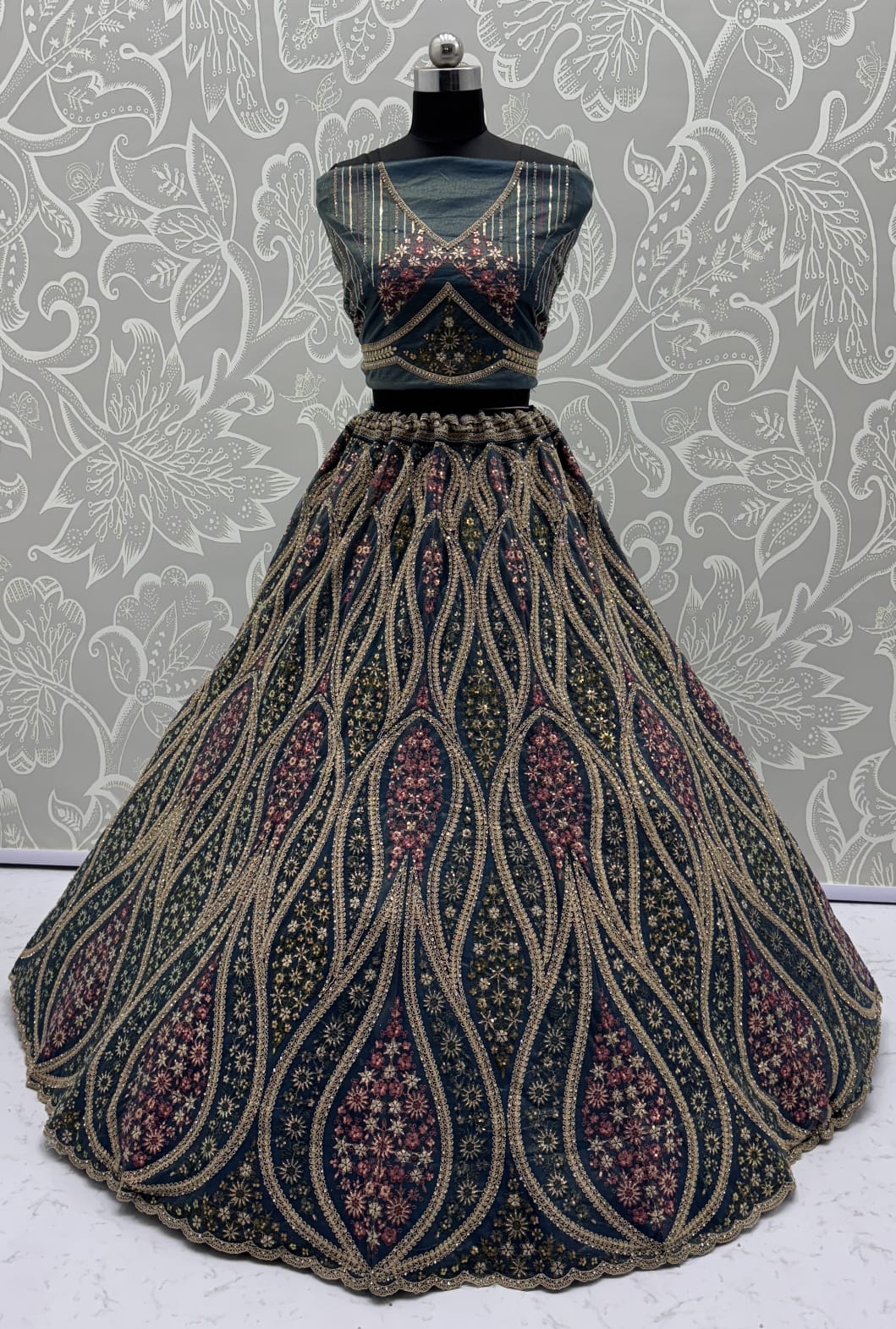 Abstinent Blue Art of Work with Detailed Thread work Designer LehengaCholi perfect for reception wear