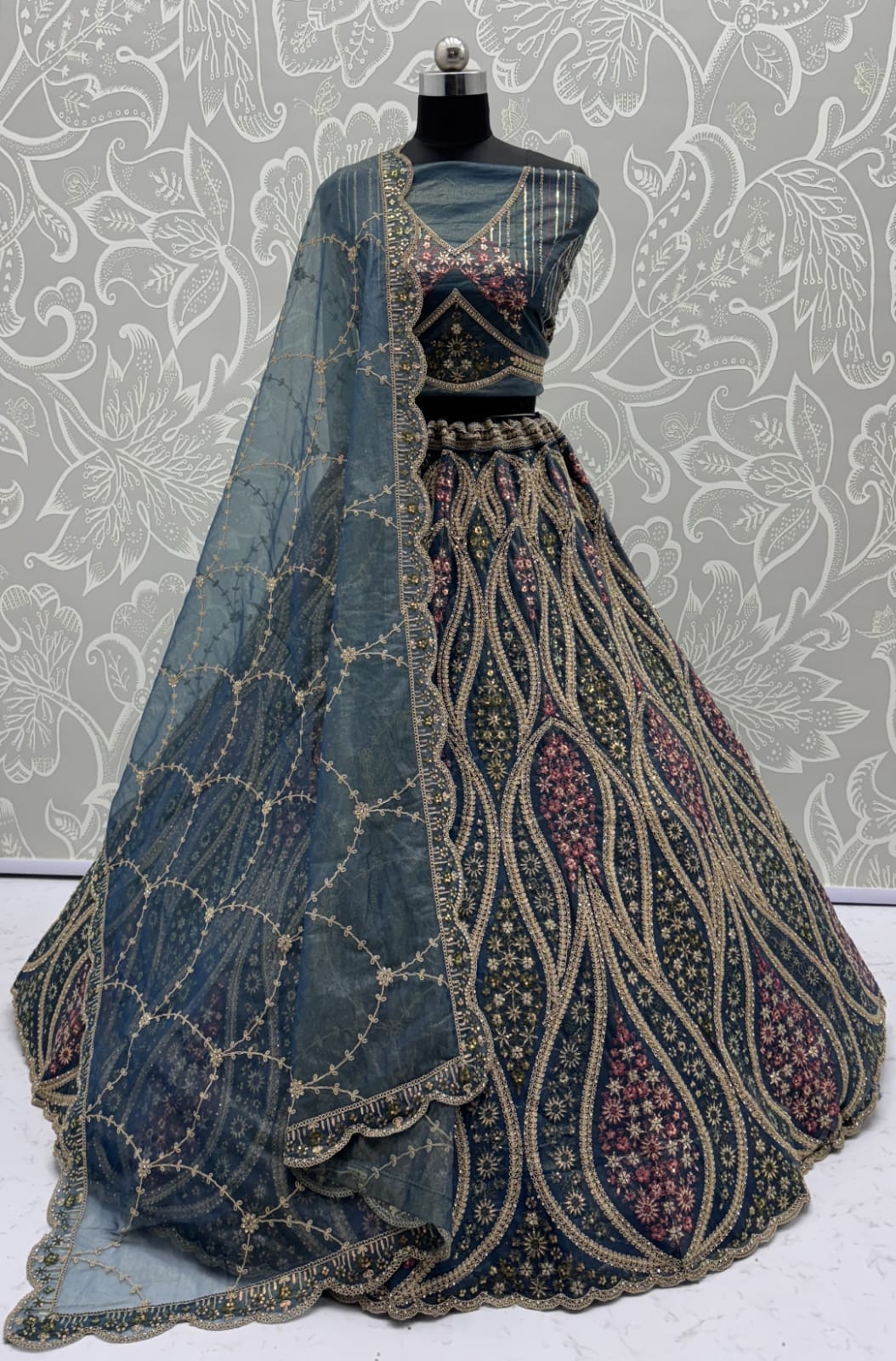 Abstinent Blue Art of Work with Detailed Thread work Designer LehengaCholi perfect for reception wear