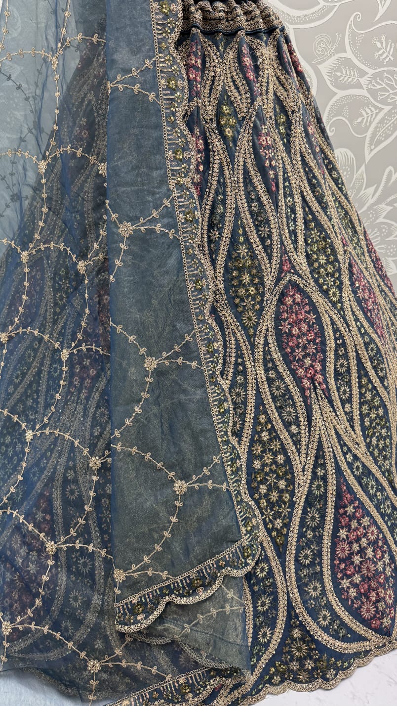 Abstinent Blue Art of Work with Detailed Thread work Designer LehengaCholi perfect for reception wear