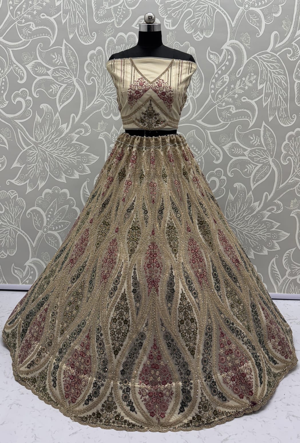 Abstinent Golden Art of Work with Detailed Thread work Designer LehengaCholi perfect for reception wear