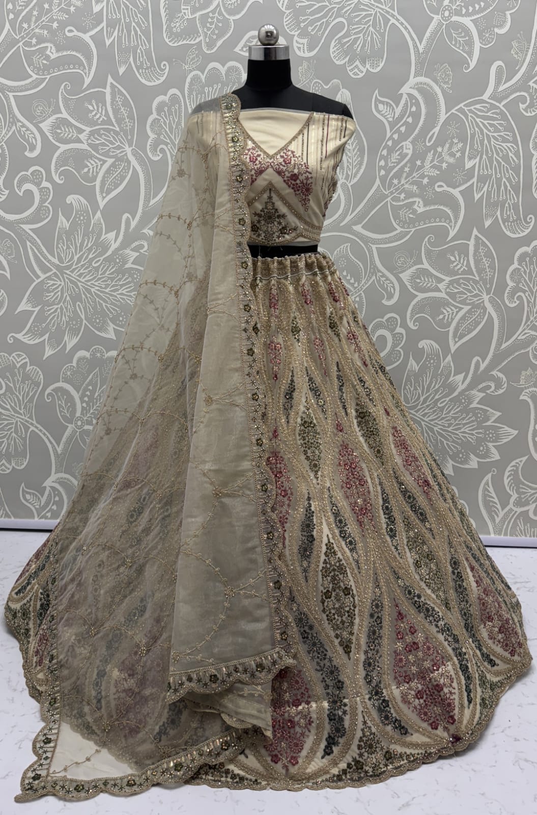 Abstinent Golden Art of Work with Detailed Thread work Designer LehengaCholi perfect for reception wear