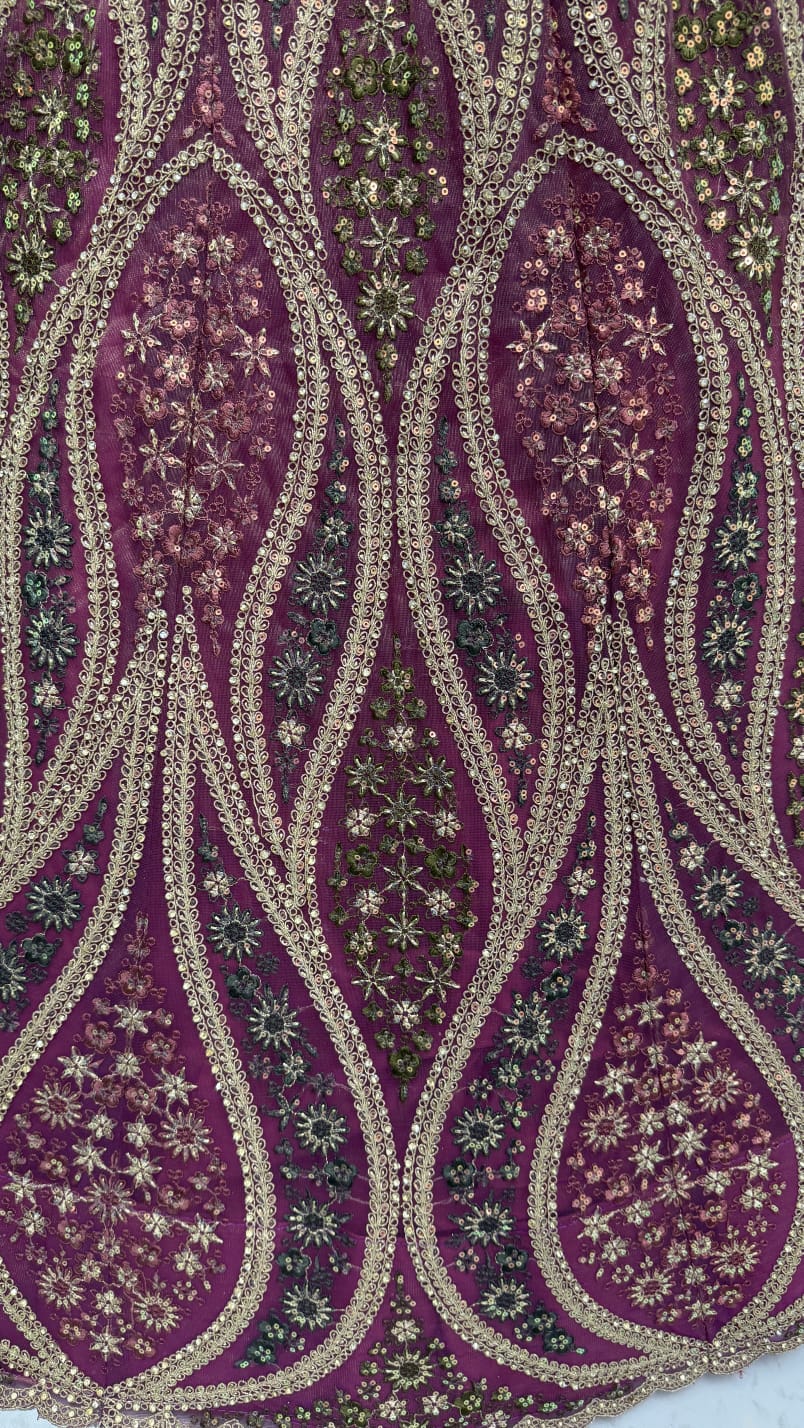 Abstinent Magenta Art of Work with Detailed Thread work Designer LehengaCholi perfect for reception wear