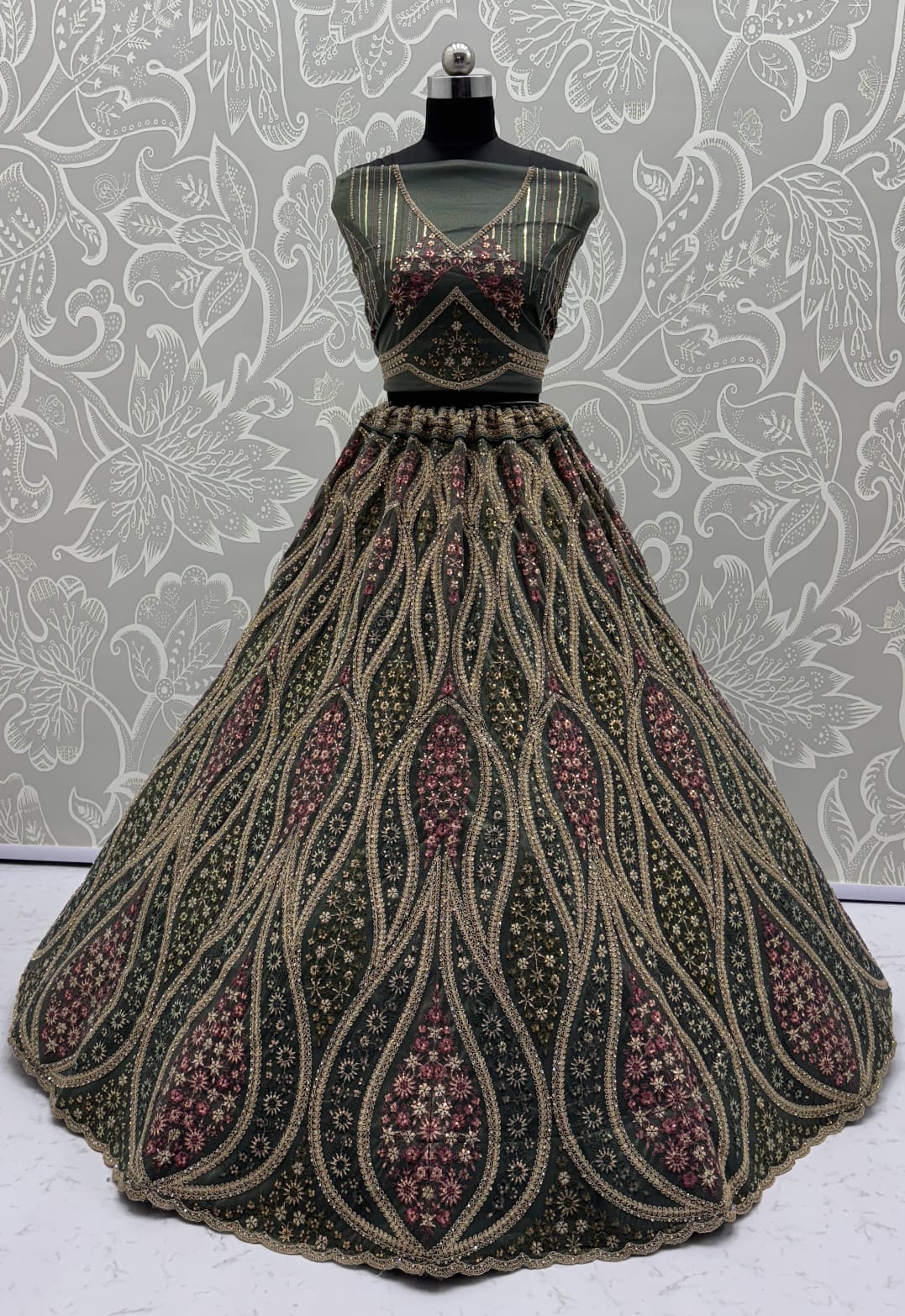 Abstinent Olive Green Art of Work with Detailed Thread work Designer LehengaCholi perfect for reception wear