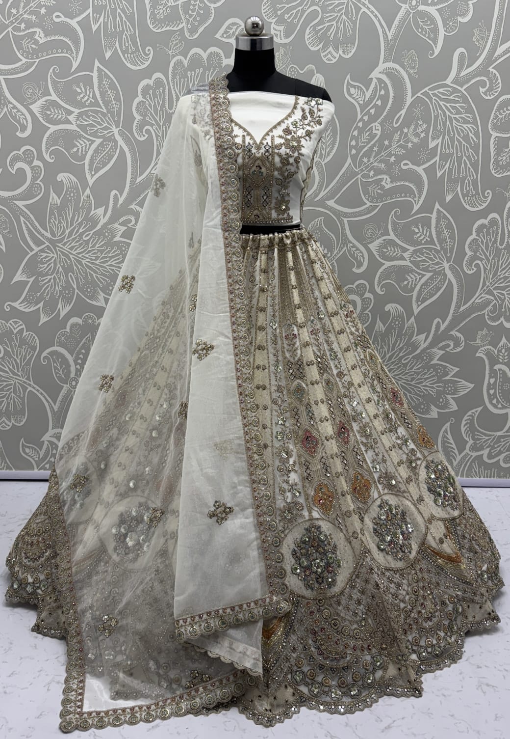Metalic White Embroidery on Vibrant Color Designer Partywear Lehengacholi 