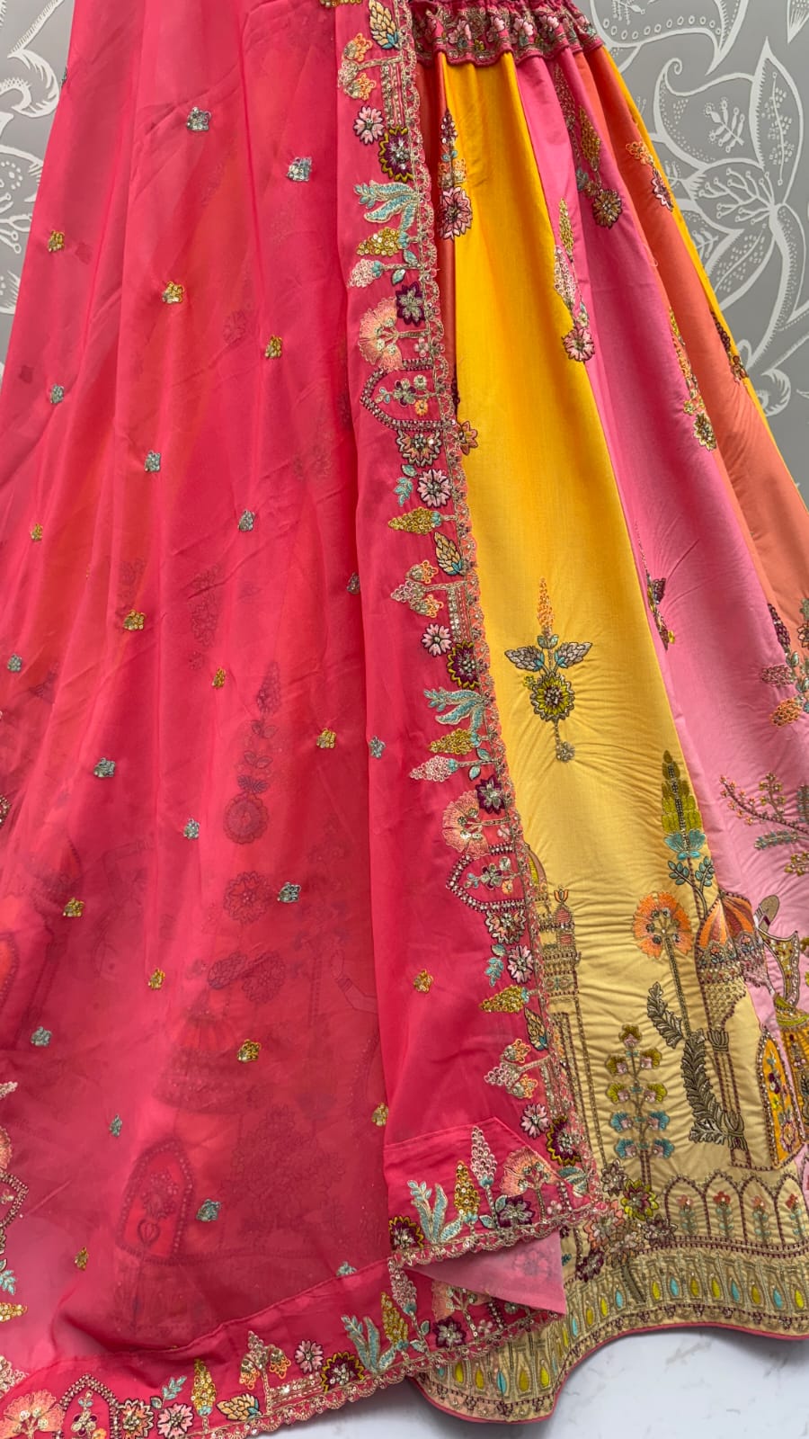 Exceptional pink Craft Embroidery Patch on Multi Color Lehenga with Sober Embroidery work on it with beautiful dupatta and Blouse 
