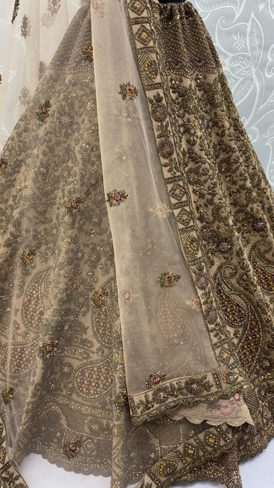 Grand Beige Zari Embroidery Net Sangeet Wear Lehenga Choli With Dupatta