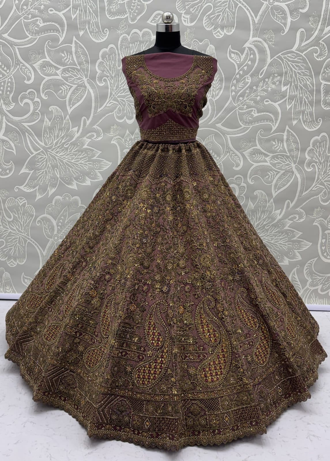 Luxurious Mauve Dori Work Net Reception Wear Lehenga With Blouse