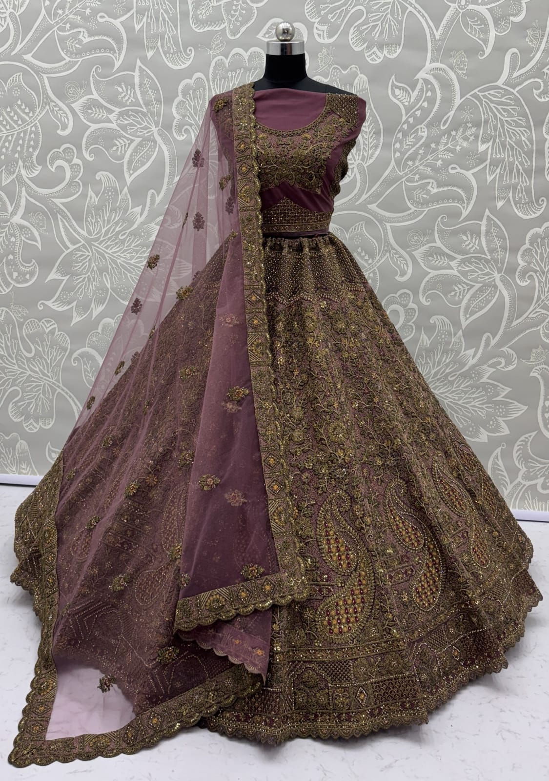 Luxurious Mauve Dori Work Net Reception Wear Lehenga With Blouse