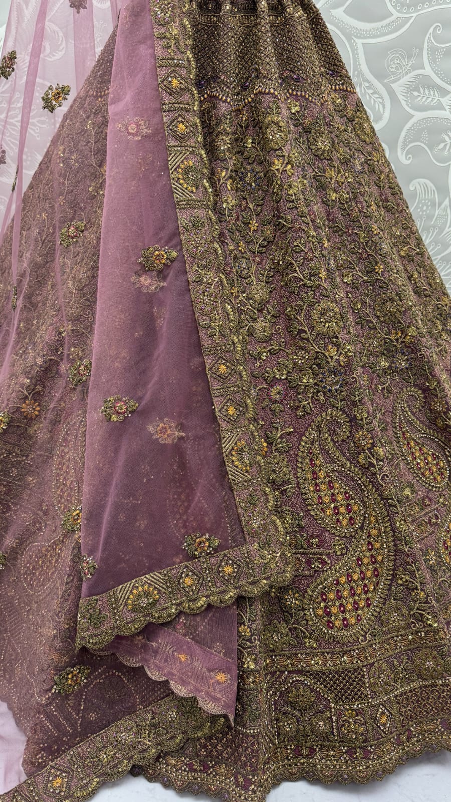 Luxurious Mauve Dori Work Net Reception Wear Lehenga With Blouse