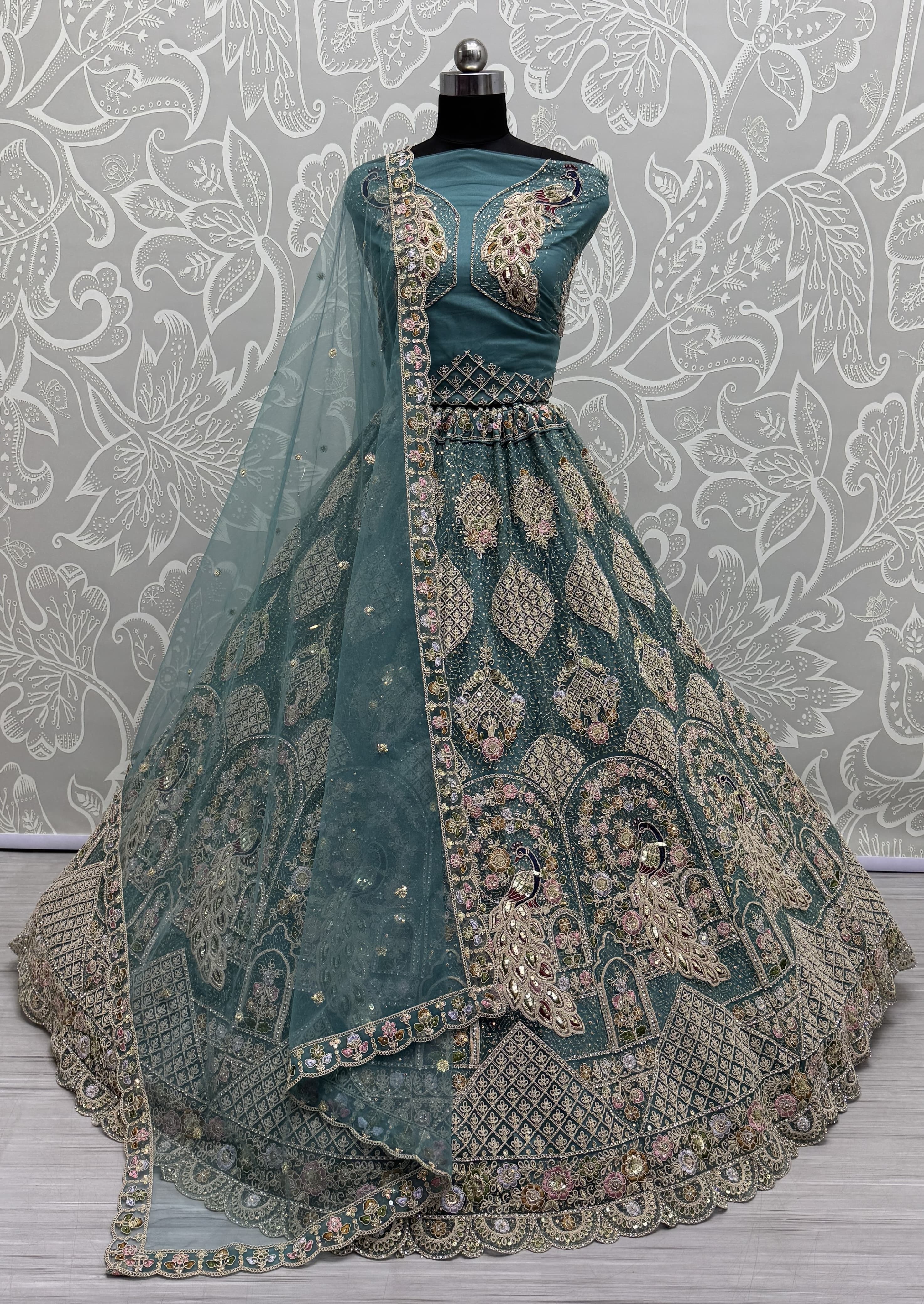 Outstanding blue Dori Embroidery with Heavy Diamond Embedded Peacock pattern with Sequins work Designer Partywear Lehenga choli