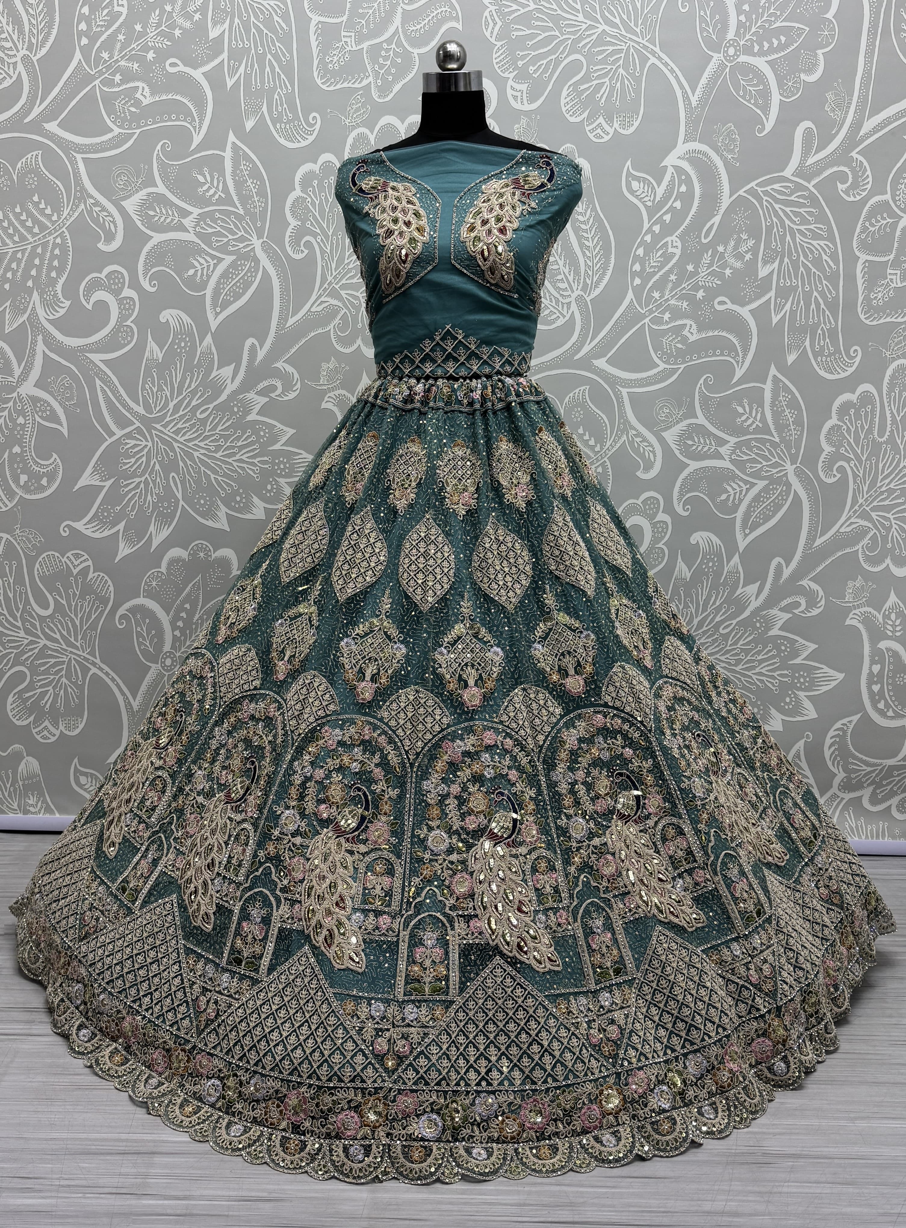 Outstanding blue Dori Embroidery with Heavy Diamond Embedded Peacock pattern with Sequins work Designer Partywear Lehenga choli