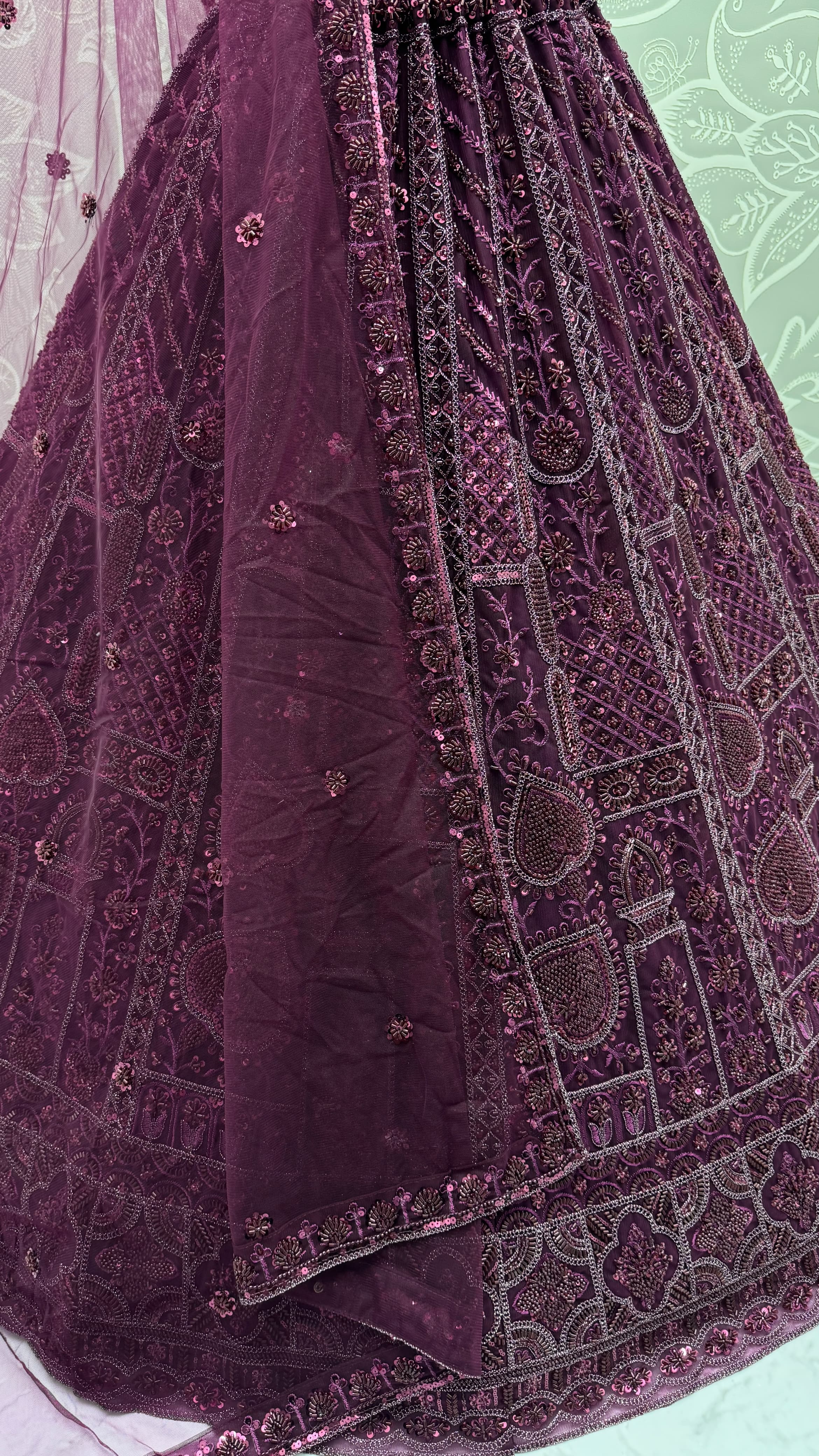 Sober Handwork Maroon Motif and Crystal Pipe work Designed Reception Wear Collection in Lehenga Choli