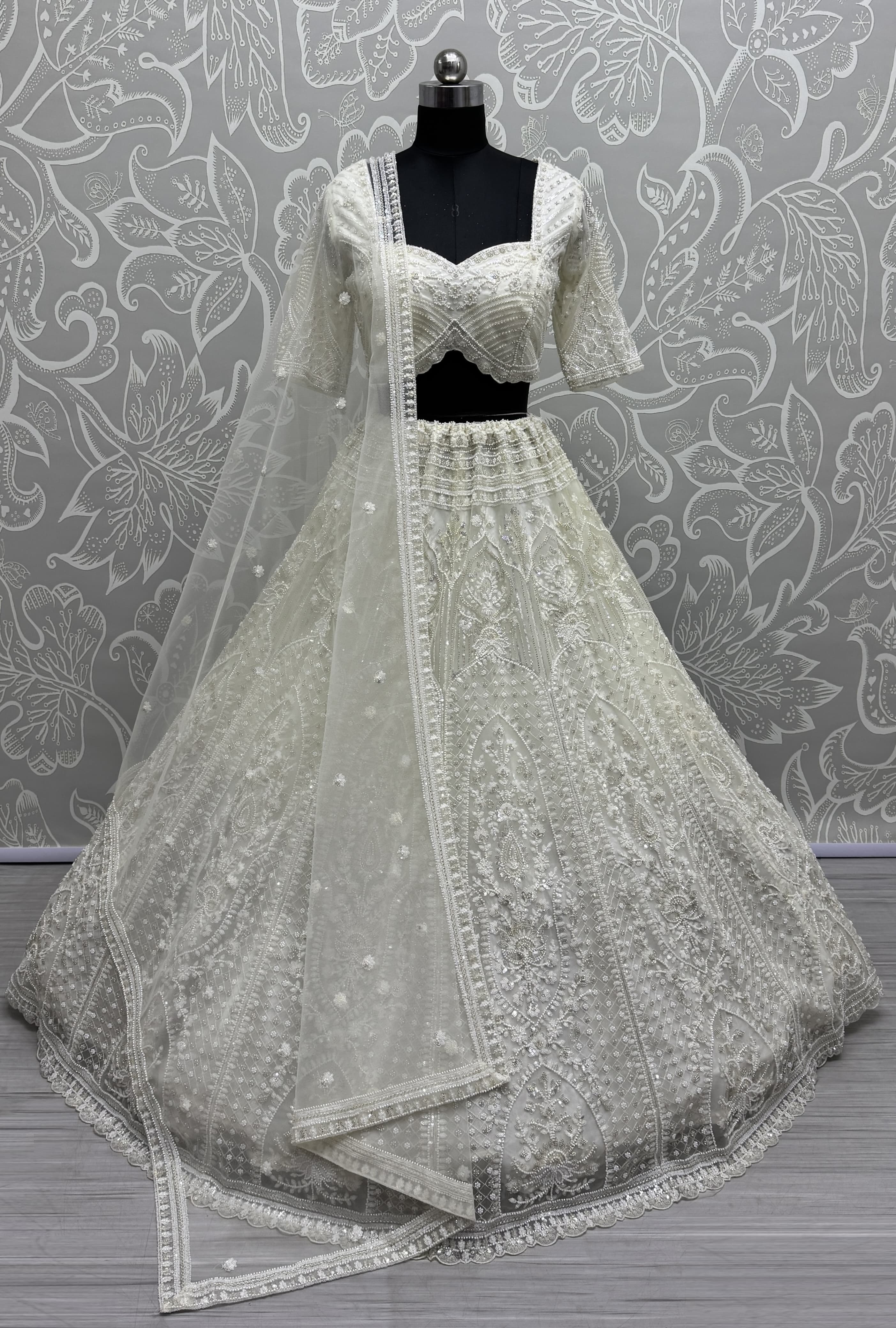 Stunning Beads and Motif White work combine Designer lehenga choli with stitch Blouse