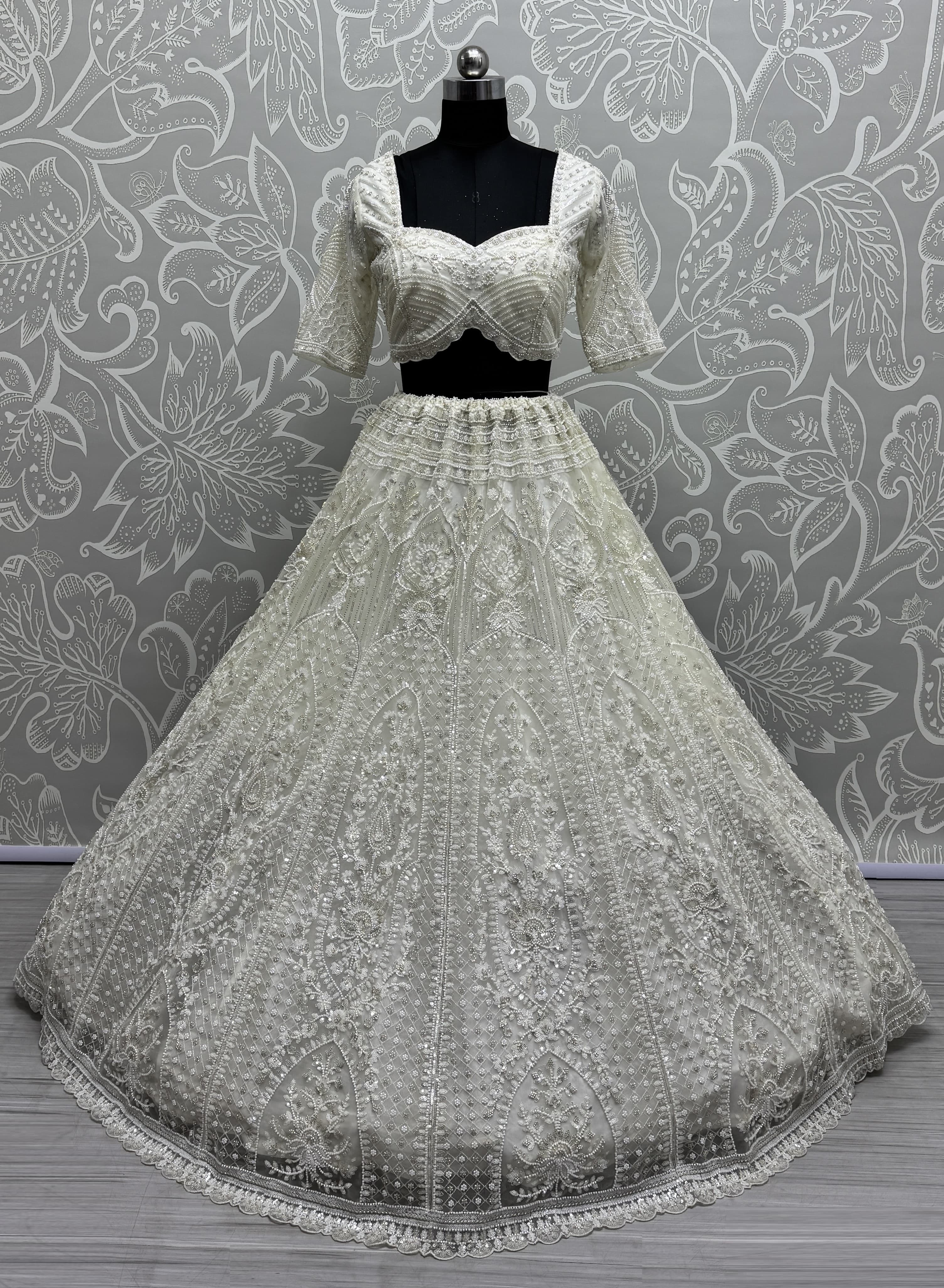 Stunning Beads and Motif White work combine Designer lehenga choli with stitch Blouse