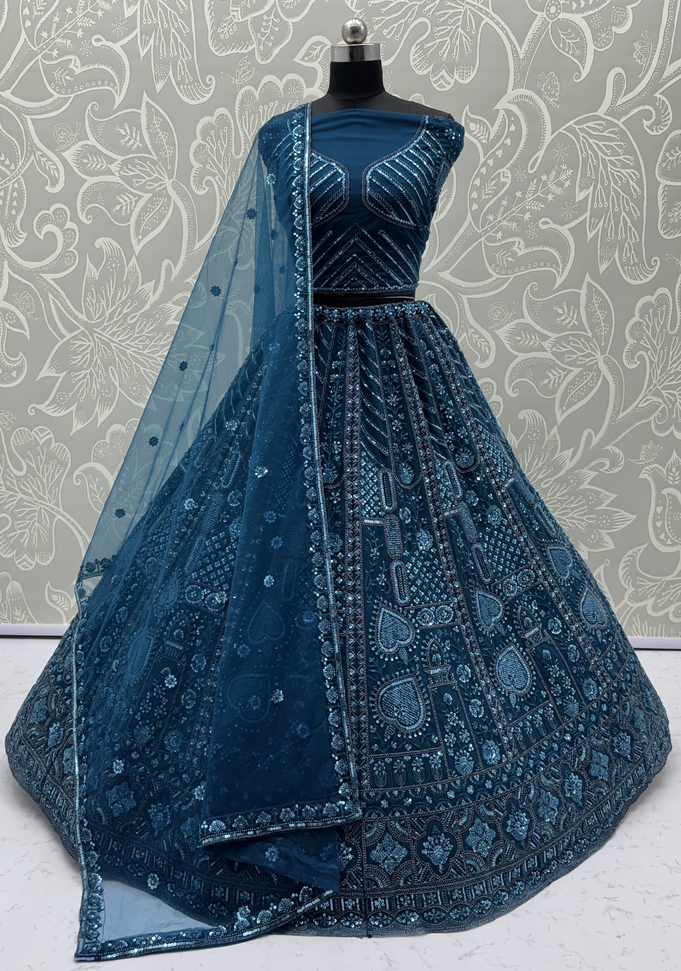 Sober Handwork Blue Motif and Crystal Pipe work Designed Reception Wear Collection in Lehenga Choli