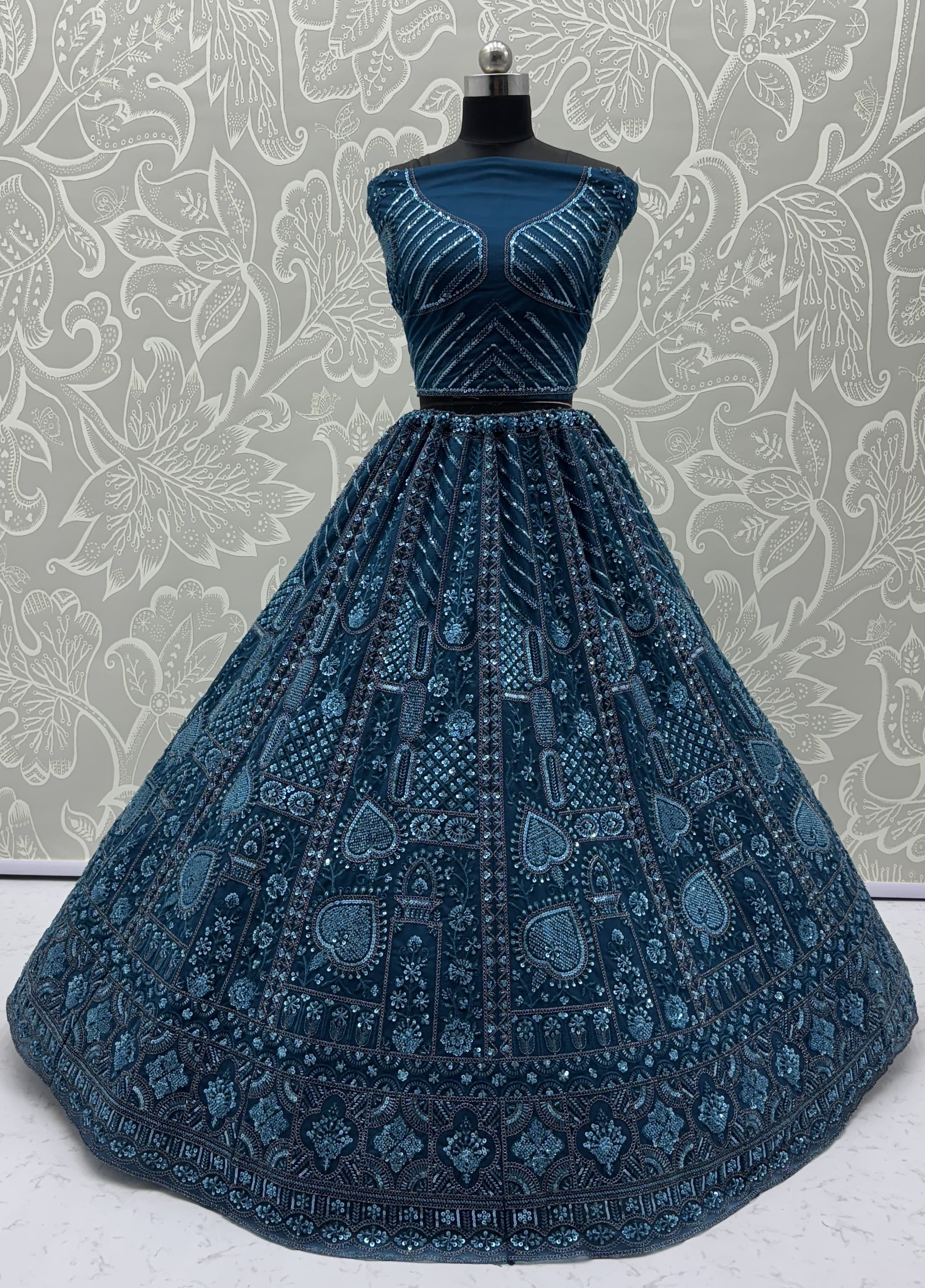 Sober Handwork Blue Motif and Crystal Pipe work Designed Reception Wear Collection in Lehenga Choli