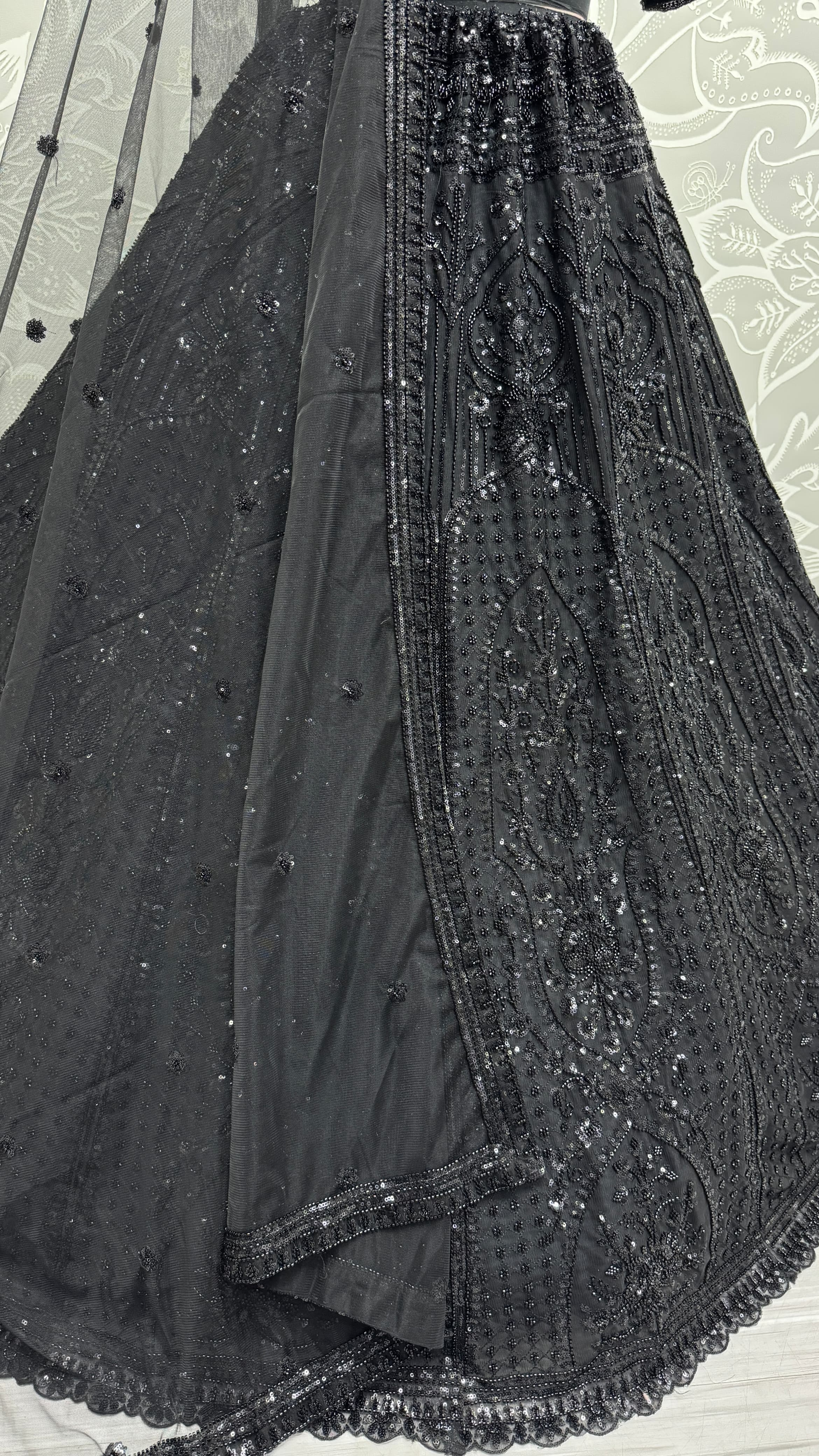 Stunning Beads and Motif work combine Black Designer lehenga choli with stitch Blouse
