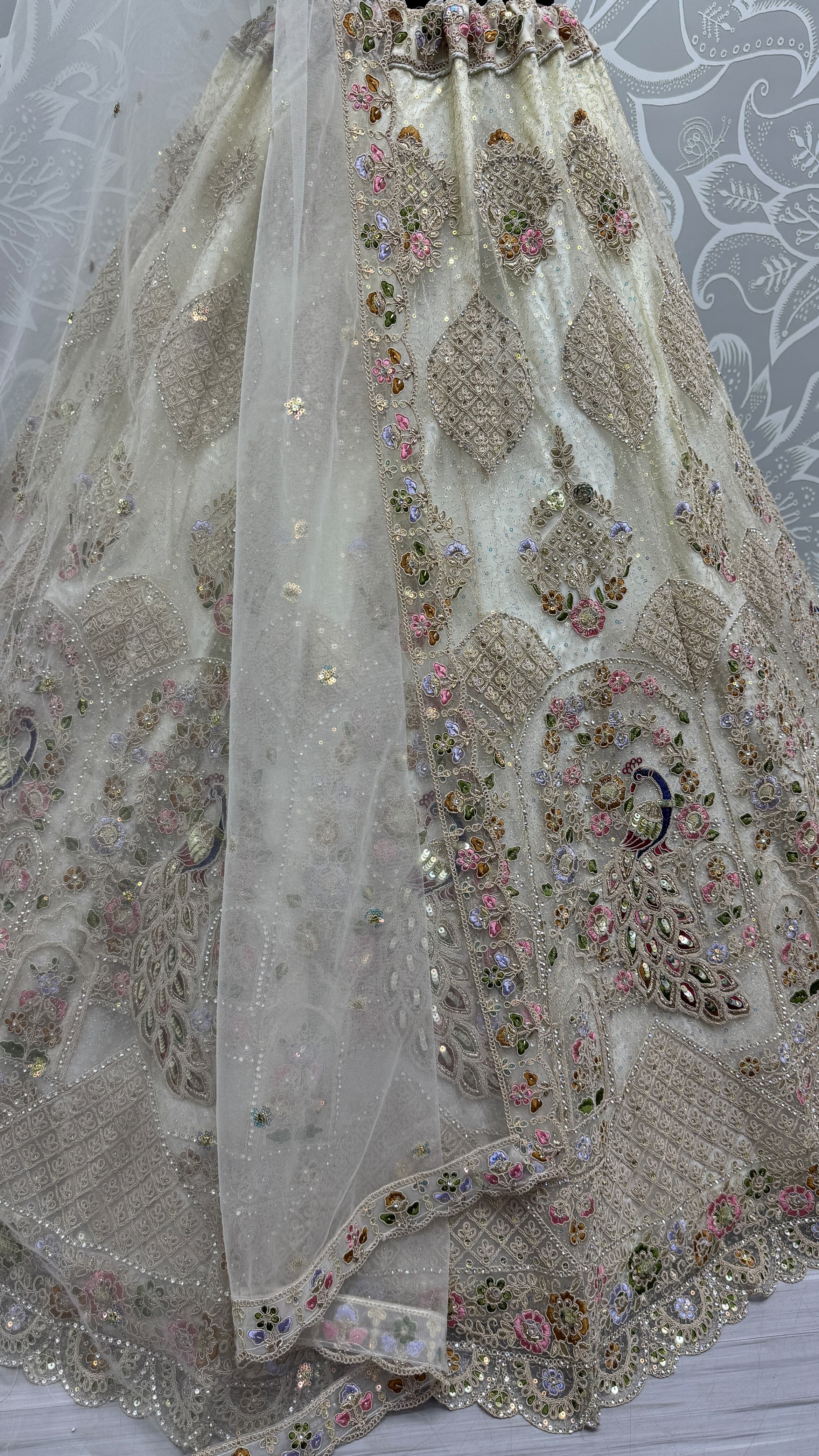 Outstanding White Dori Embroidery with Heavy Diamond Embedded Peacock pattern with Sequins work Designer Partywear Lehenga choli