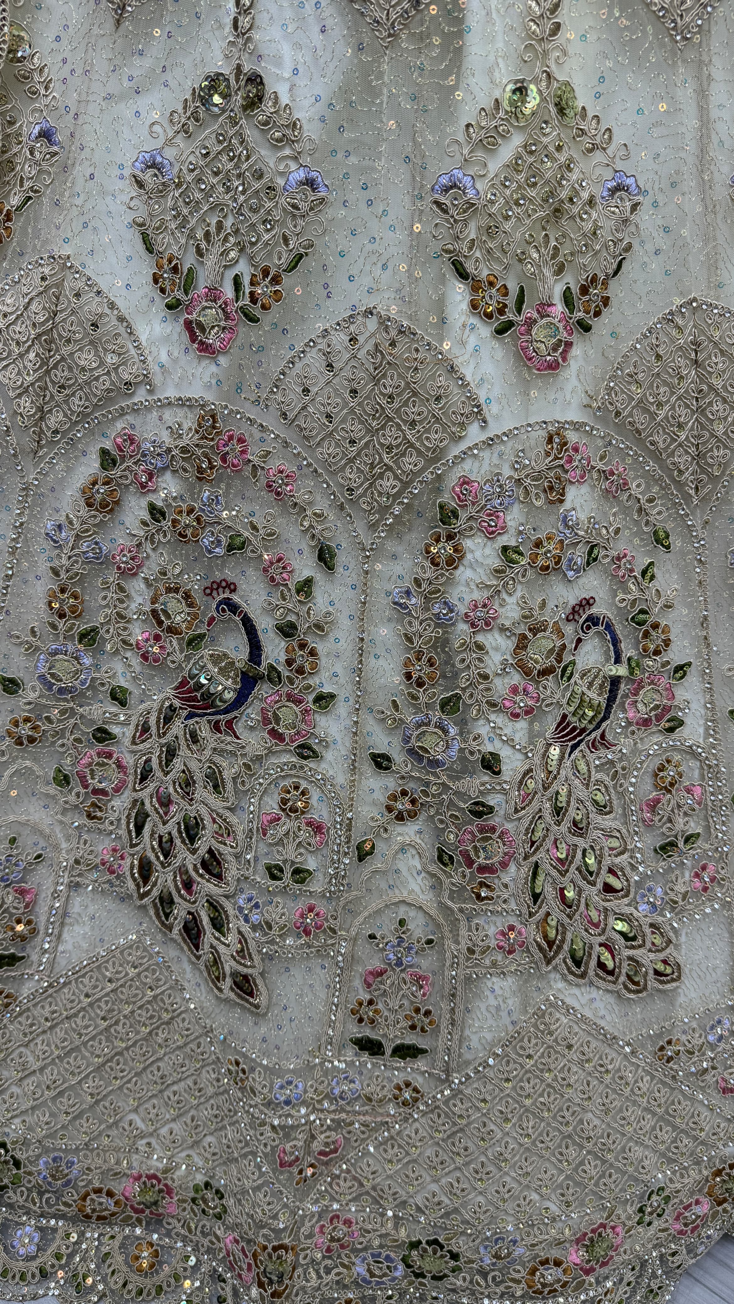 Outstanding White Dori Embroidery with Heavy Diamond Embedded Peacock pattern with Sequins work Designer Partywear Lehenga choli