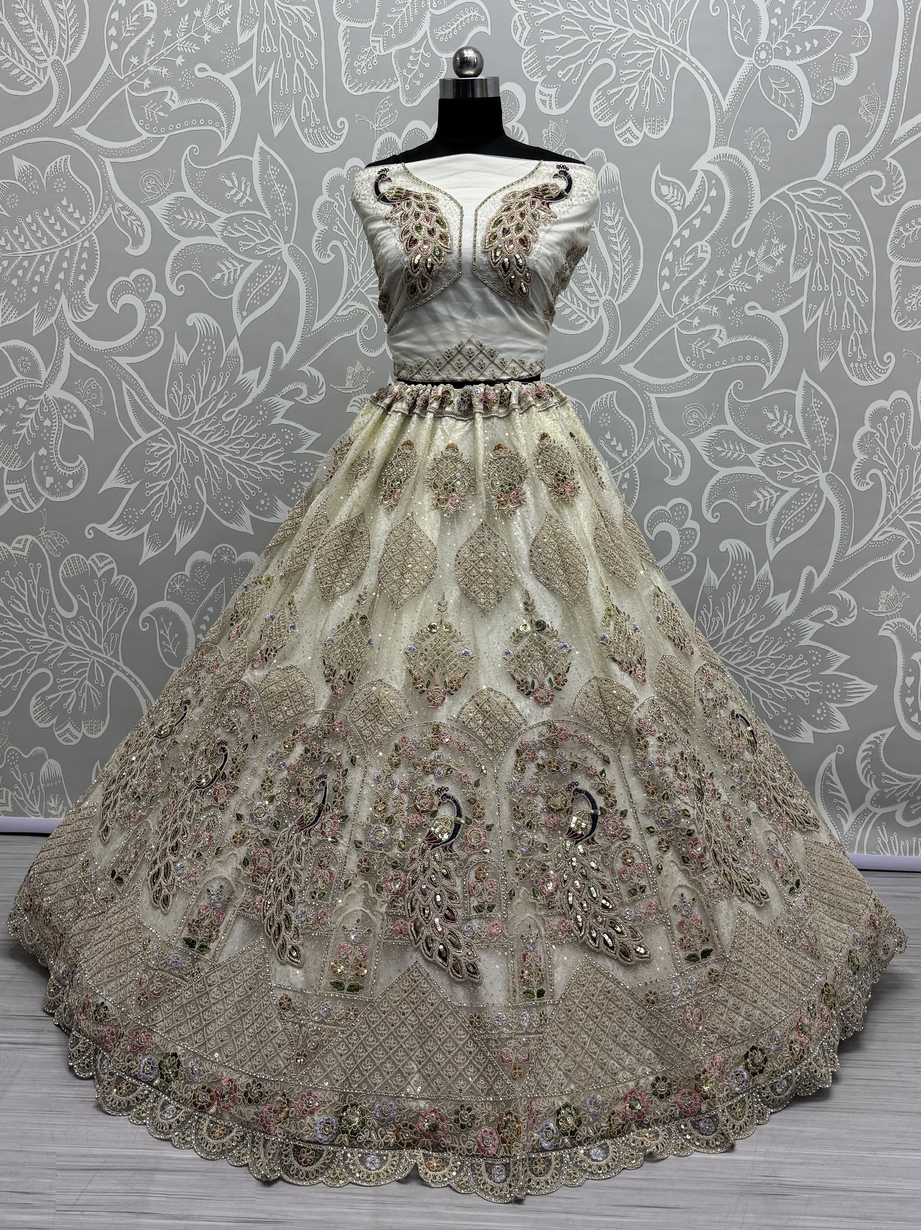 Outstanding White Dori Embroidery with Heavy Diamond Embedded Peacock pattern with Sequins work Designer Partywear Lehenga choli