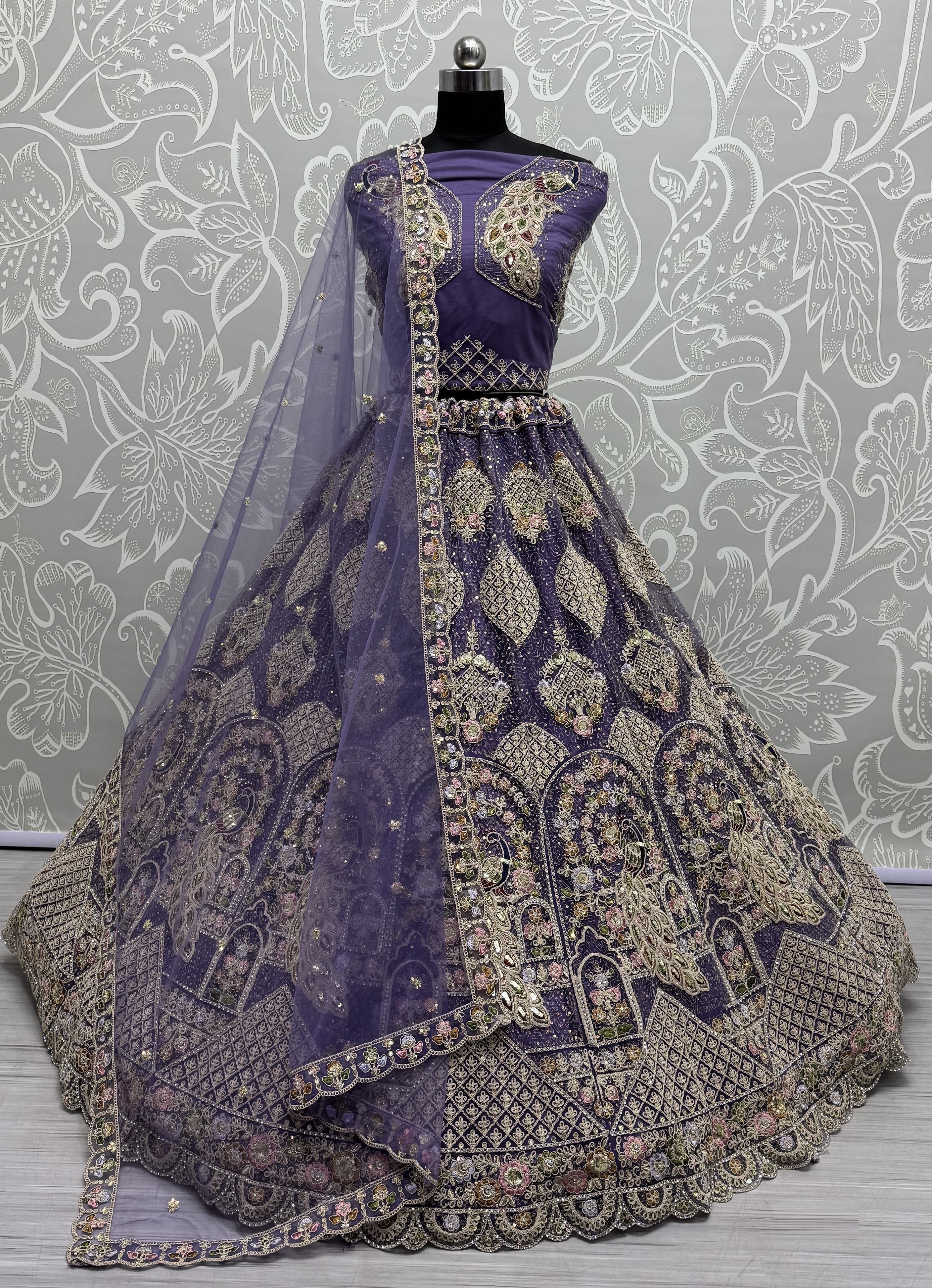 Outstanding purple Dori Embroidery with Heavy Diamond Embedded Peacock pattern with Sequins work Designer Partywear Lehenga choli 