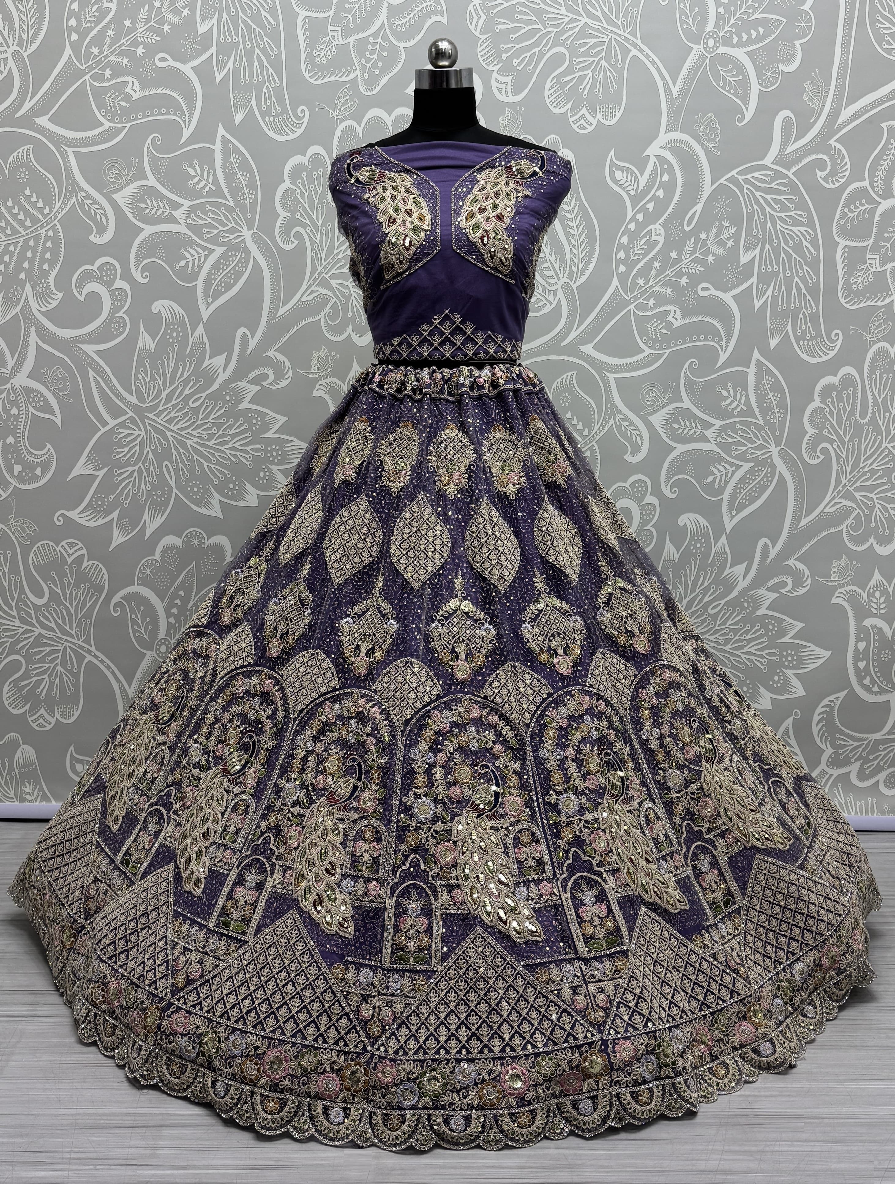Outstanding purple Dori Embroidery with Heavy Diamond Embedded Peacock pattern with Sequins work Designer Partywear Lehenga choli 