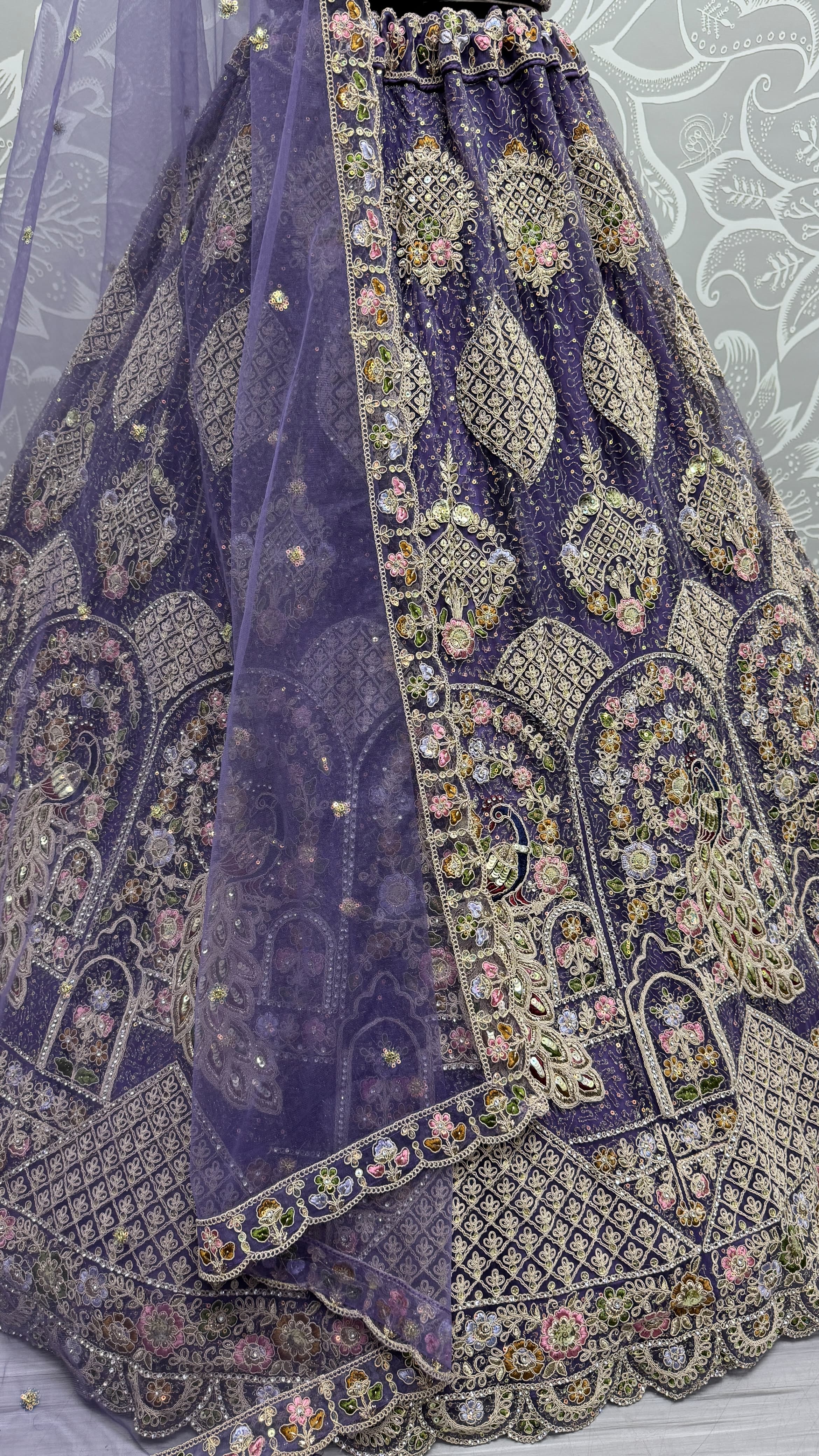Outstanding purple Dori Embroidery with Heavy Diamond Embedded Peacock pattern with Sequins work Designer Partywear Lehenga choli 