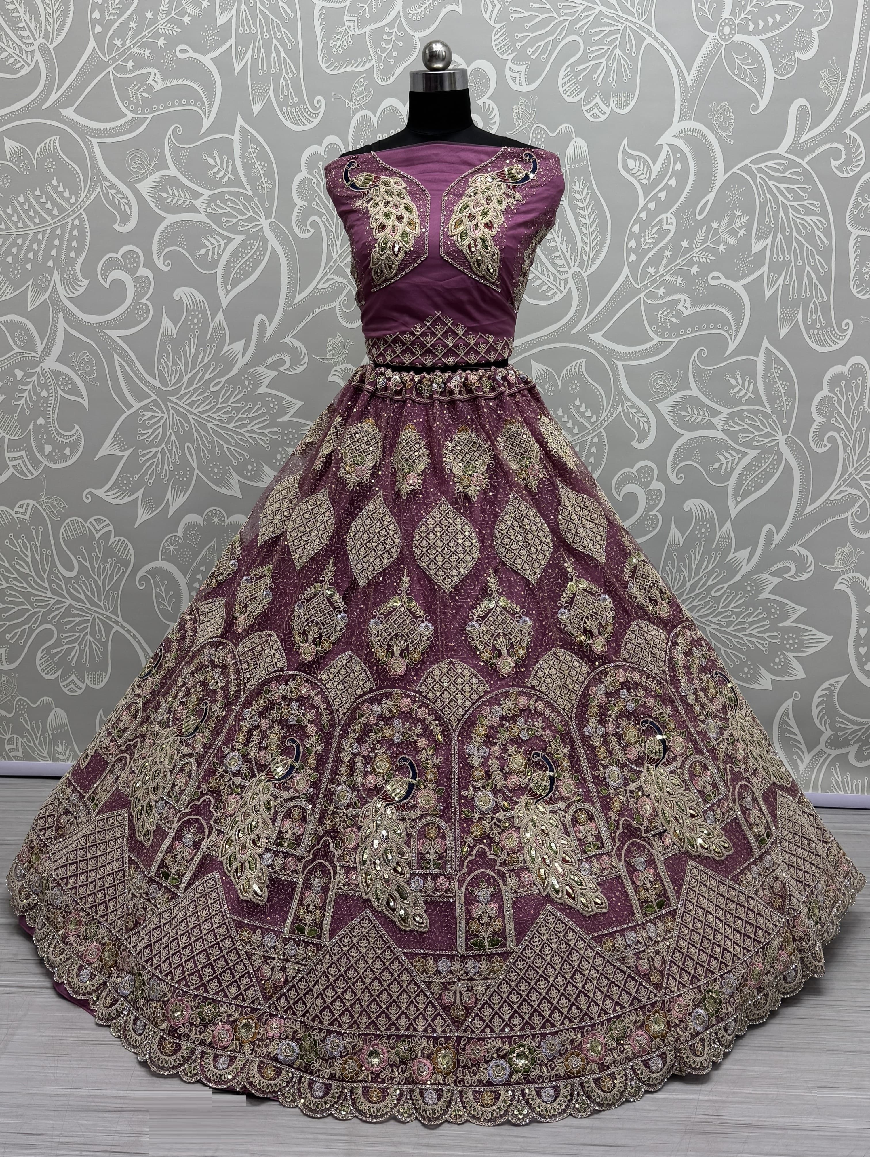 Outstanding dark pink  Dori Embroidery with Heavy Diamond Embedded Peacock pattern with Sequins work Designer Partywear Lehenga choli