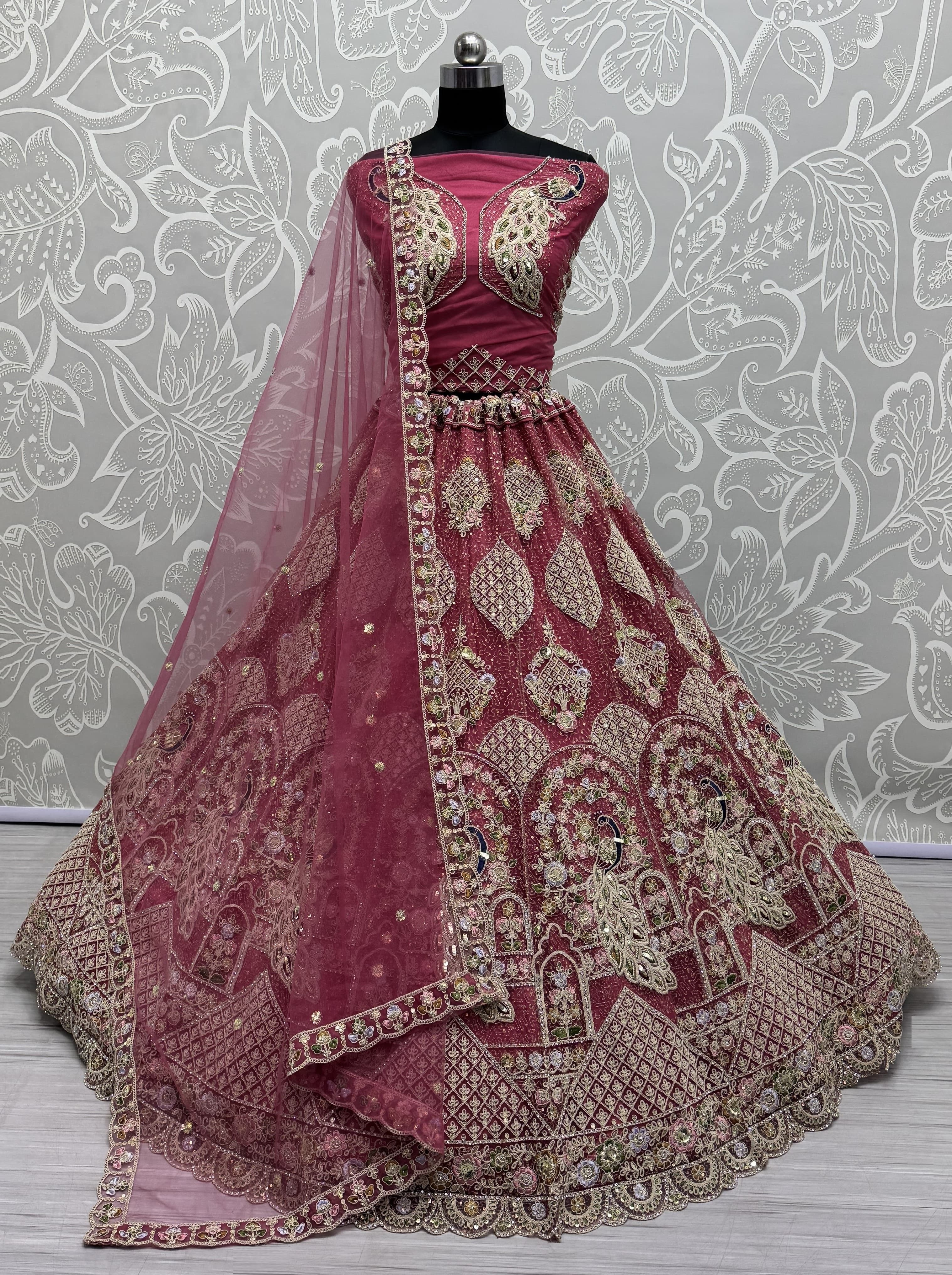 Outstanding Red Dori Embroidery with Heavy Diamond Embedded Peacock pattern with Sequins work Designer Partywear Lehenga choli 