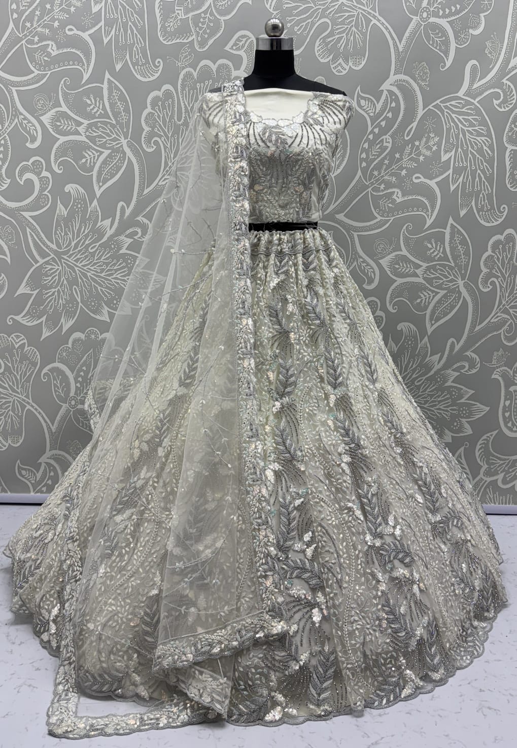 Beautiful White Dupatta on  Matching Designer Embroidered Reception wear Lehenga choli 