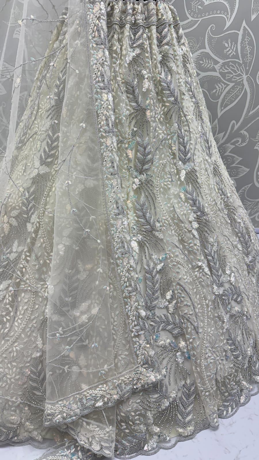 Beautiful White Dupatta on  Matching Designer Embroidered Reception wear Lehenga choli 